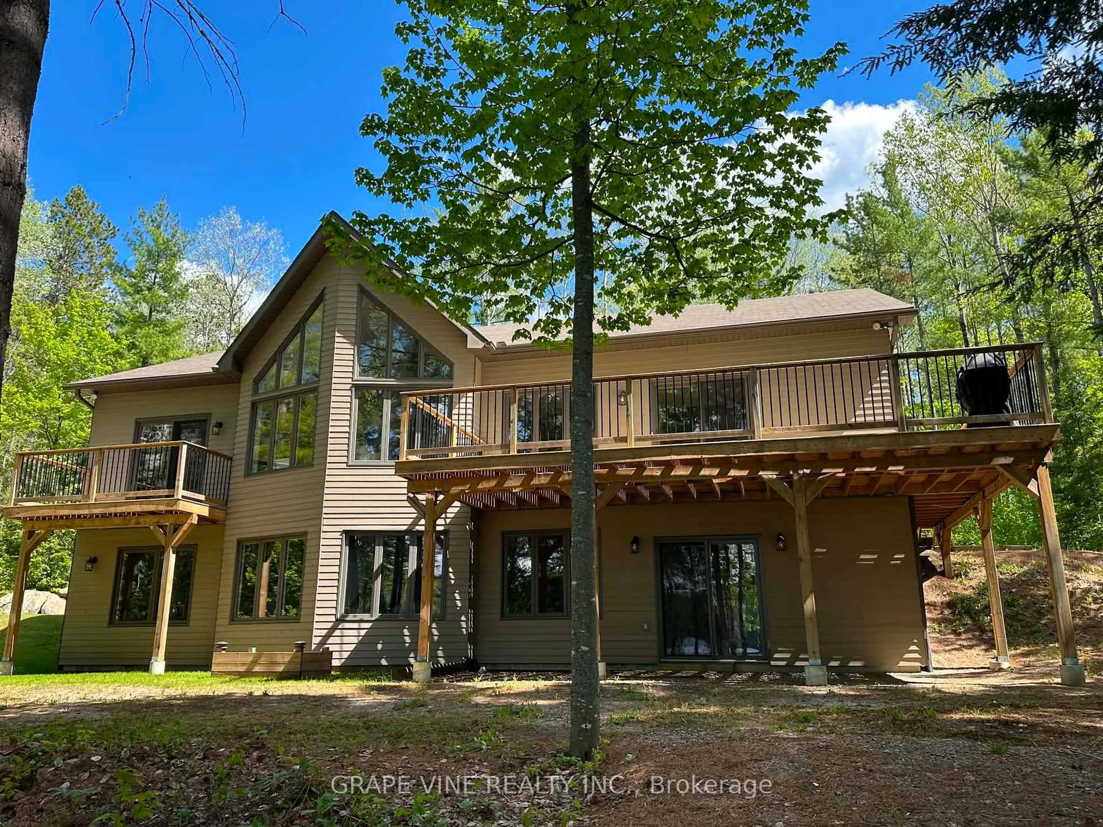 A pic from outside/outdoor area/front of a property/back of a property/a pic from drone, forest/trees view for 424 LAKEWOODS Dr, Barry's Bay Ontario K0J 1B0