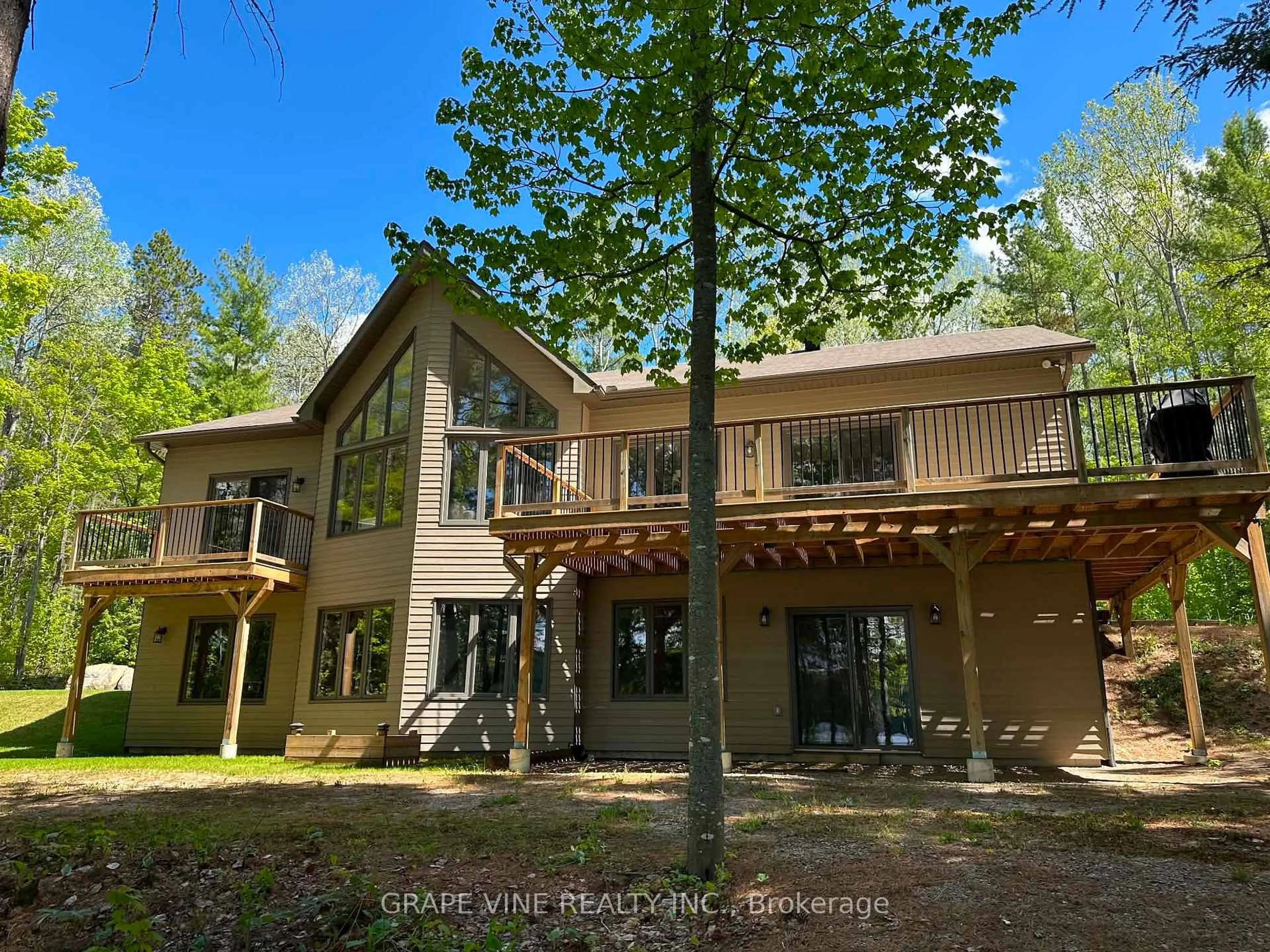 A pic from outside/outdoor area/front of a property/back of a property/a pic from drone, forest/trees view for 424 LAKEWOODS Dr, Barry's Bay Ontario K0J 1B0