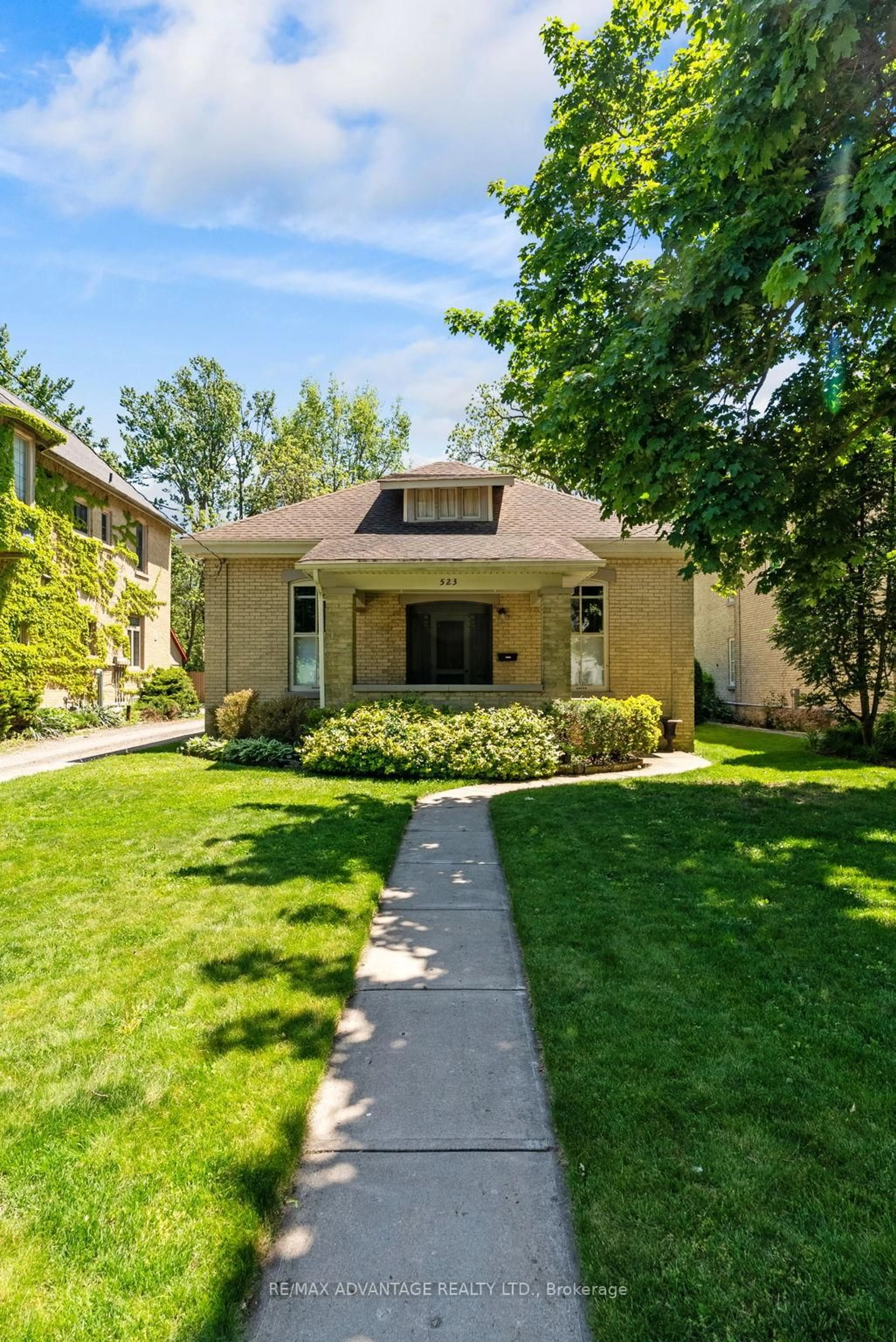 Home with brick exterior material, street for 523 Dufferin Ave, London East Ontario N6B 2A3