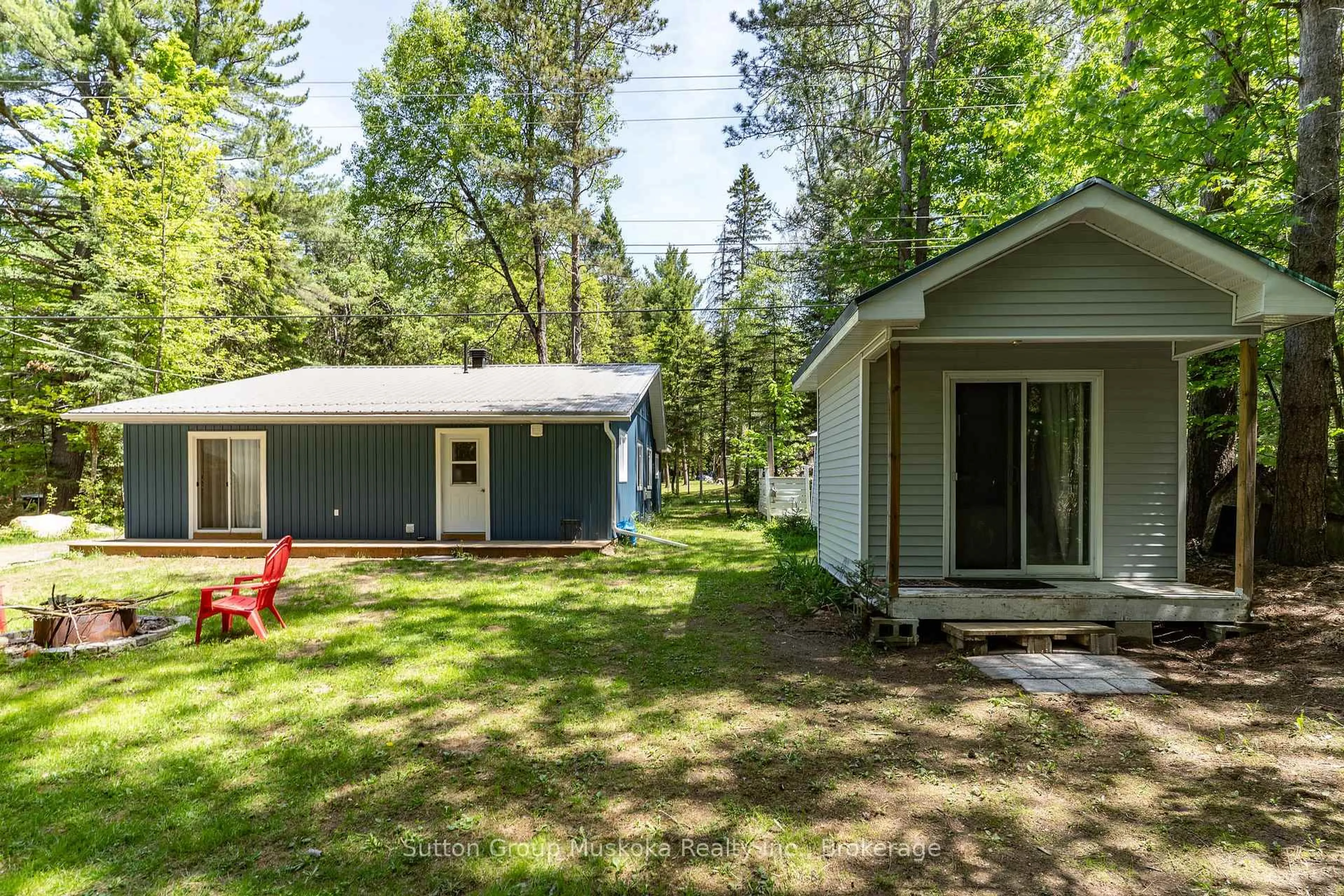 Patio, forest/trees view for 290 South Waseosa Lake Rd, Huntsville Ontario P1H 2N5