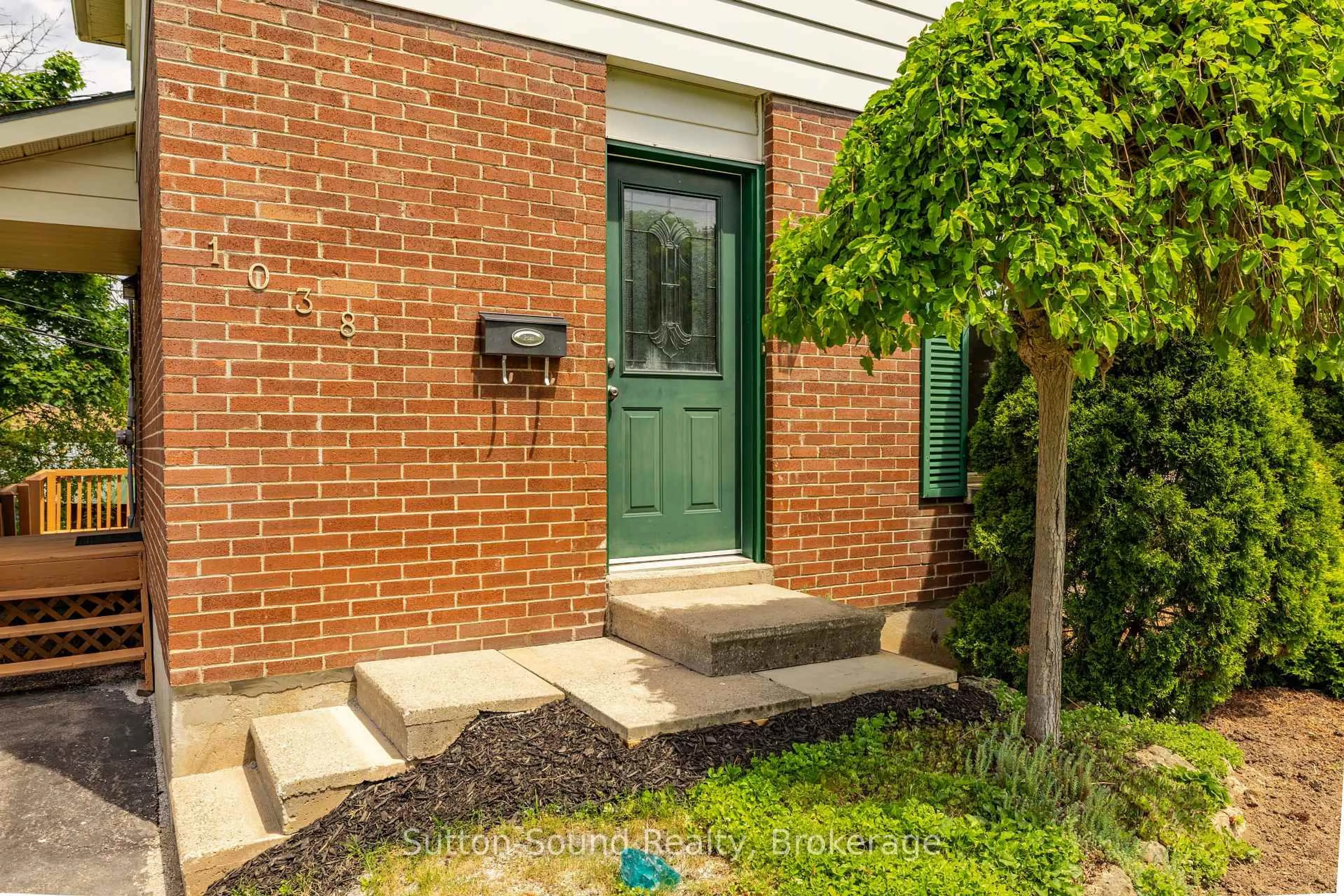 Home with brick exterior material, street for 1038 11th St, Owen Sound Ontario N4K 5V6