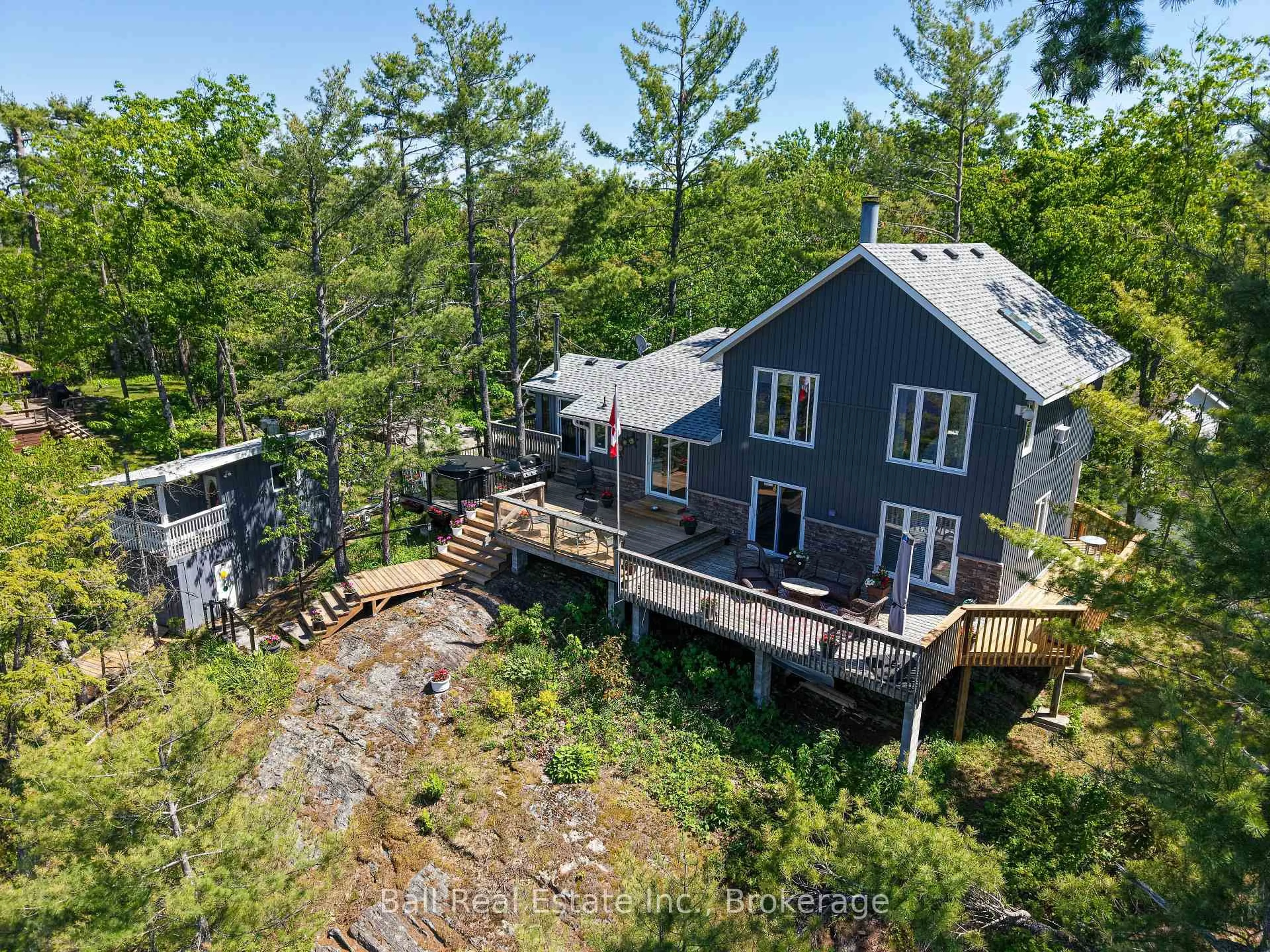 A pic from outside/outdoor area/front of a property/back of a property/a pic from drone, water/lake/river/ocean view for 85 Hillcrest Rd, North Kawartha Ontario K0L 3E0
