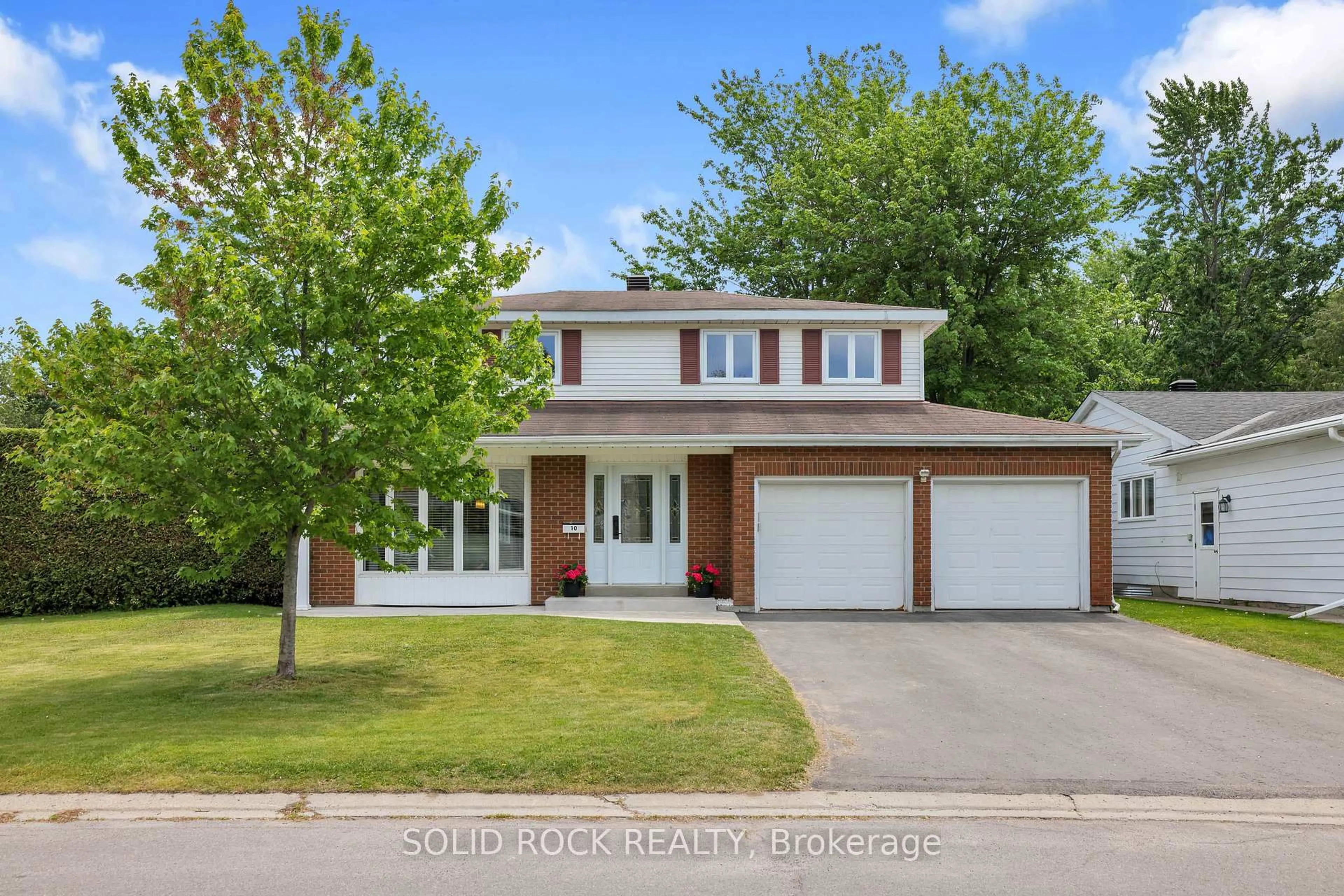 Home with brick exterior material, street for 10 Highpark Cres, Ottawa Ontario K1B 3G8