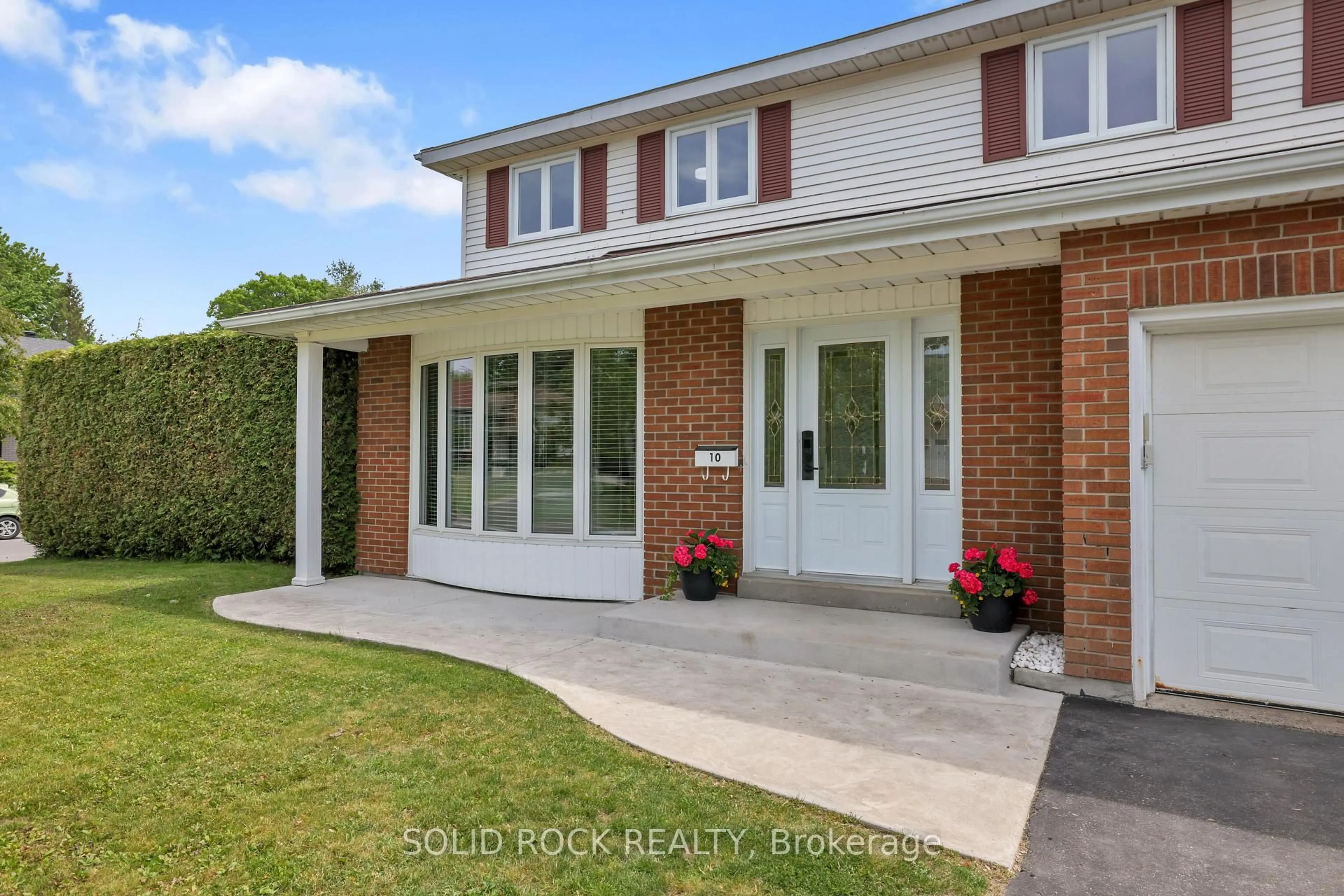 Home with brick exterior material, street for 10 Highpark Cres, Ottawa Ontario K1B 3G8