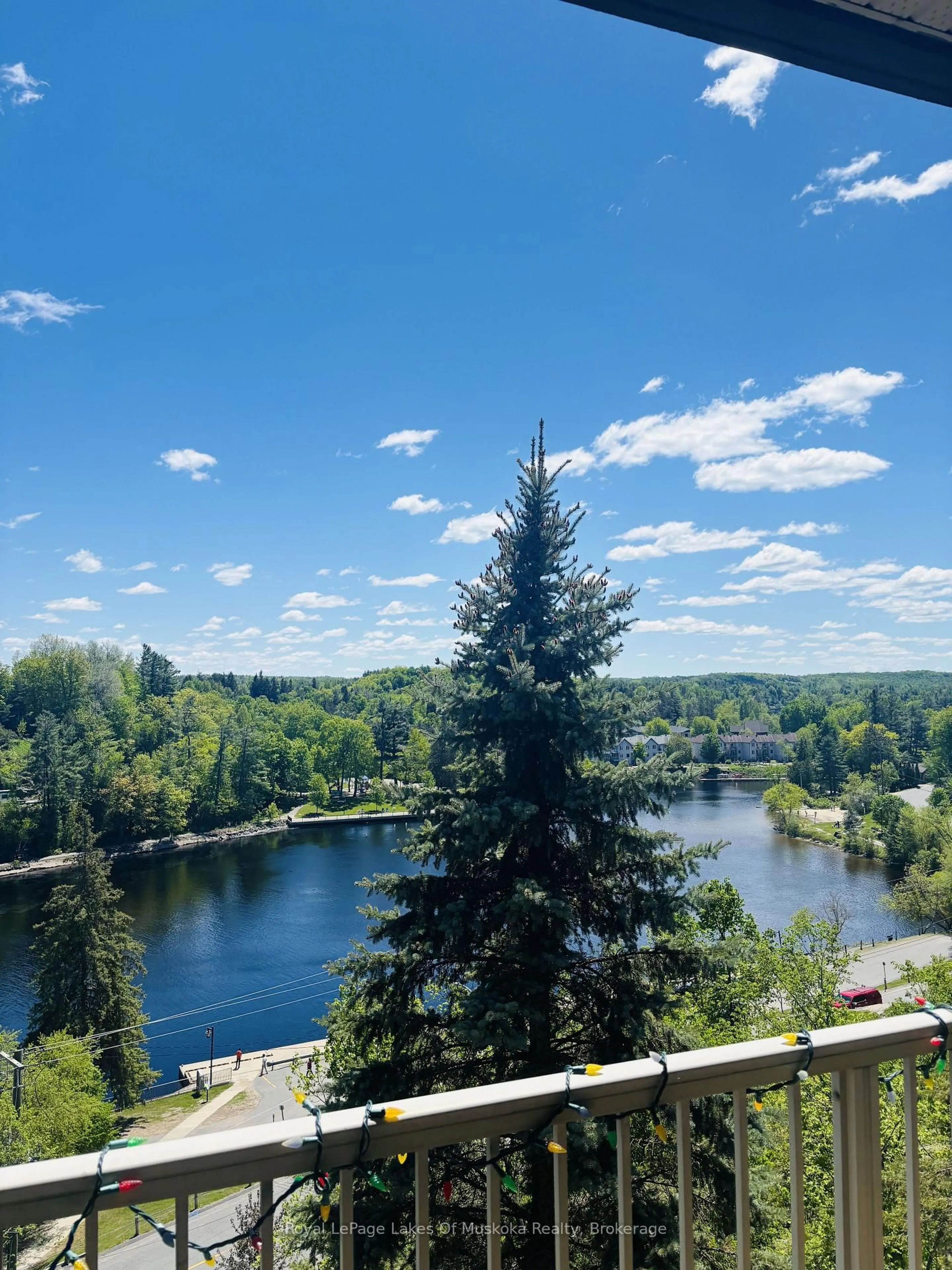 A pic from outside/outdoor area/front of a property/back of a property/a pic from drone, water/lake/river/ocean view for 24 Ontario St #403, Bracebridge Ontario P1L 2H5