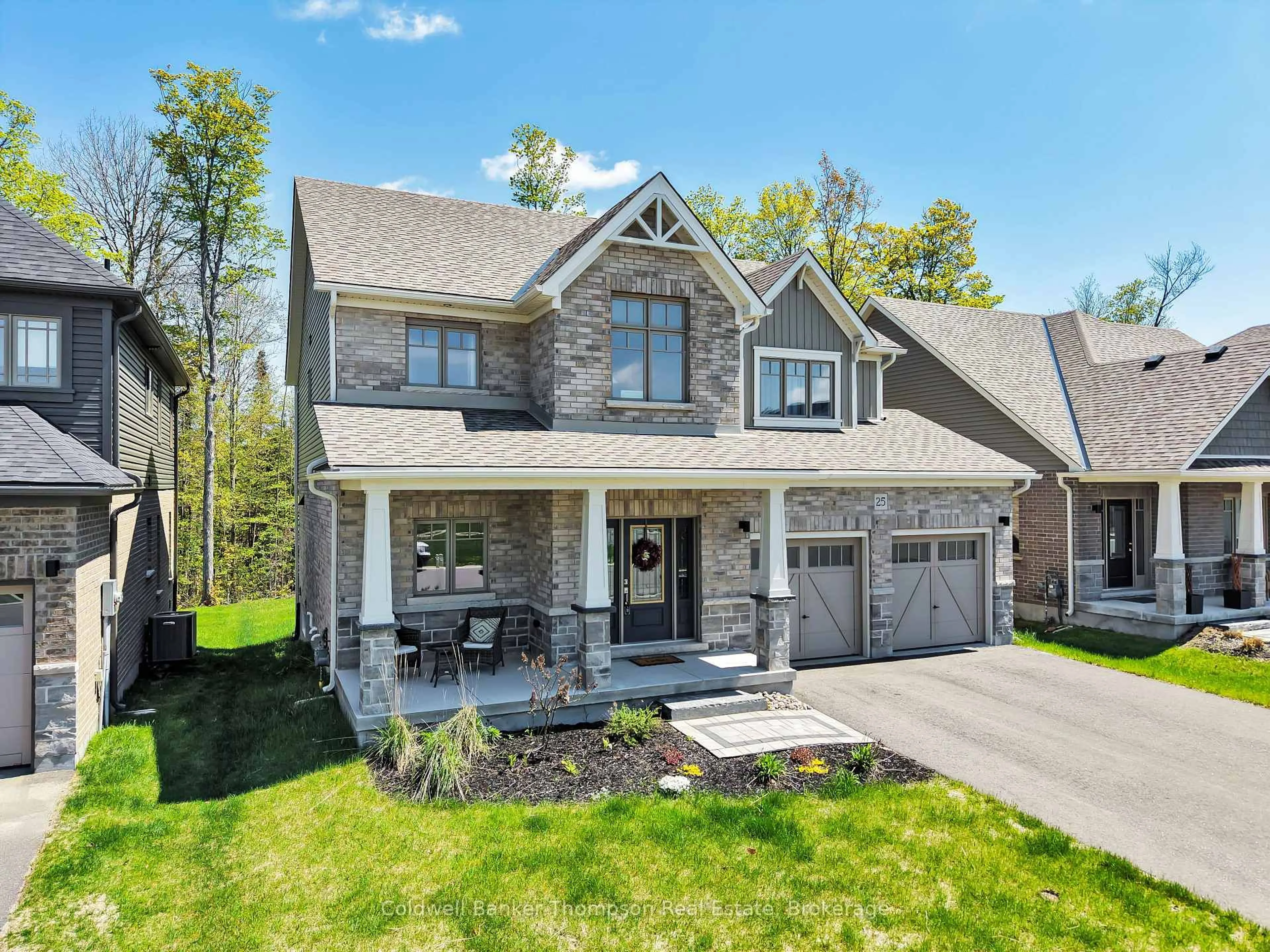 Home with brick exterior material, street for 25 Eaglecrest Ave, Huntsville Ontario P1H 0G5