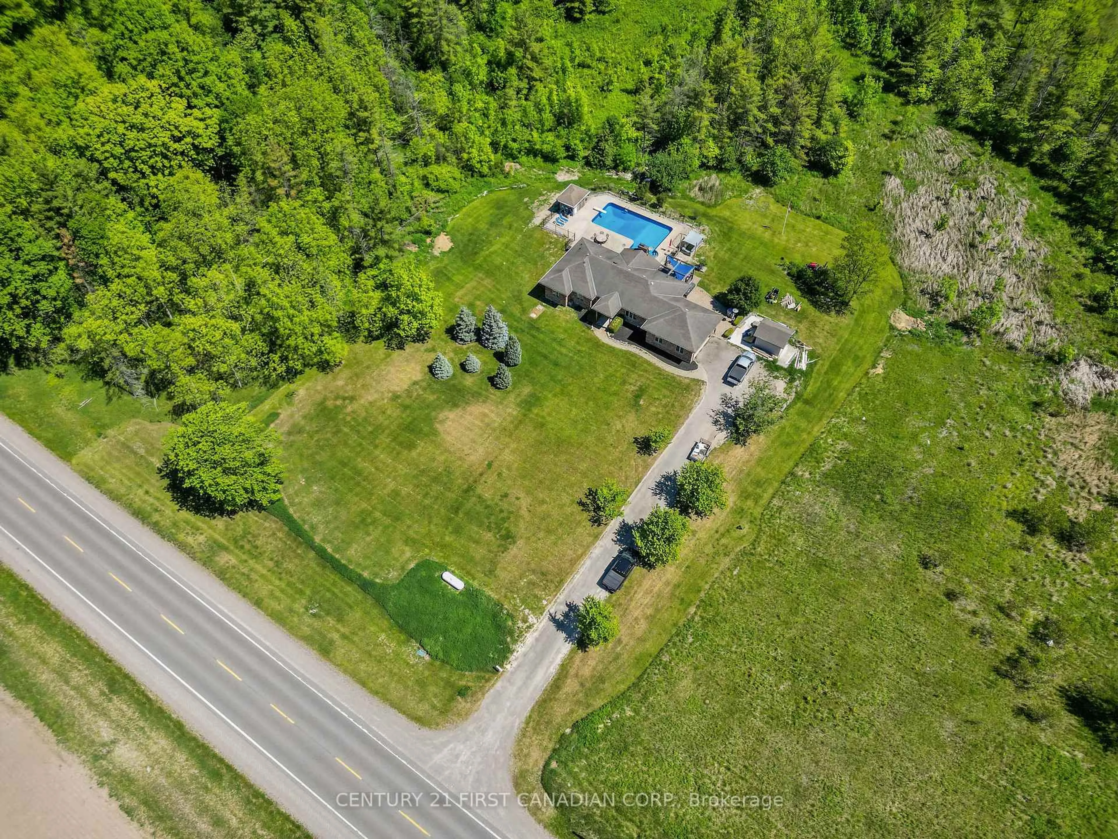 A pic from outside/outdoor area/front of a property/back of a property/a pic from drone, street for 26210 Nairn Rd, North Middlesex Ontario N0M 1A0