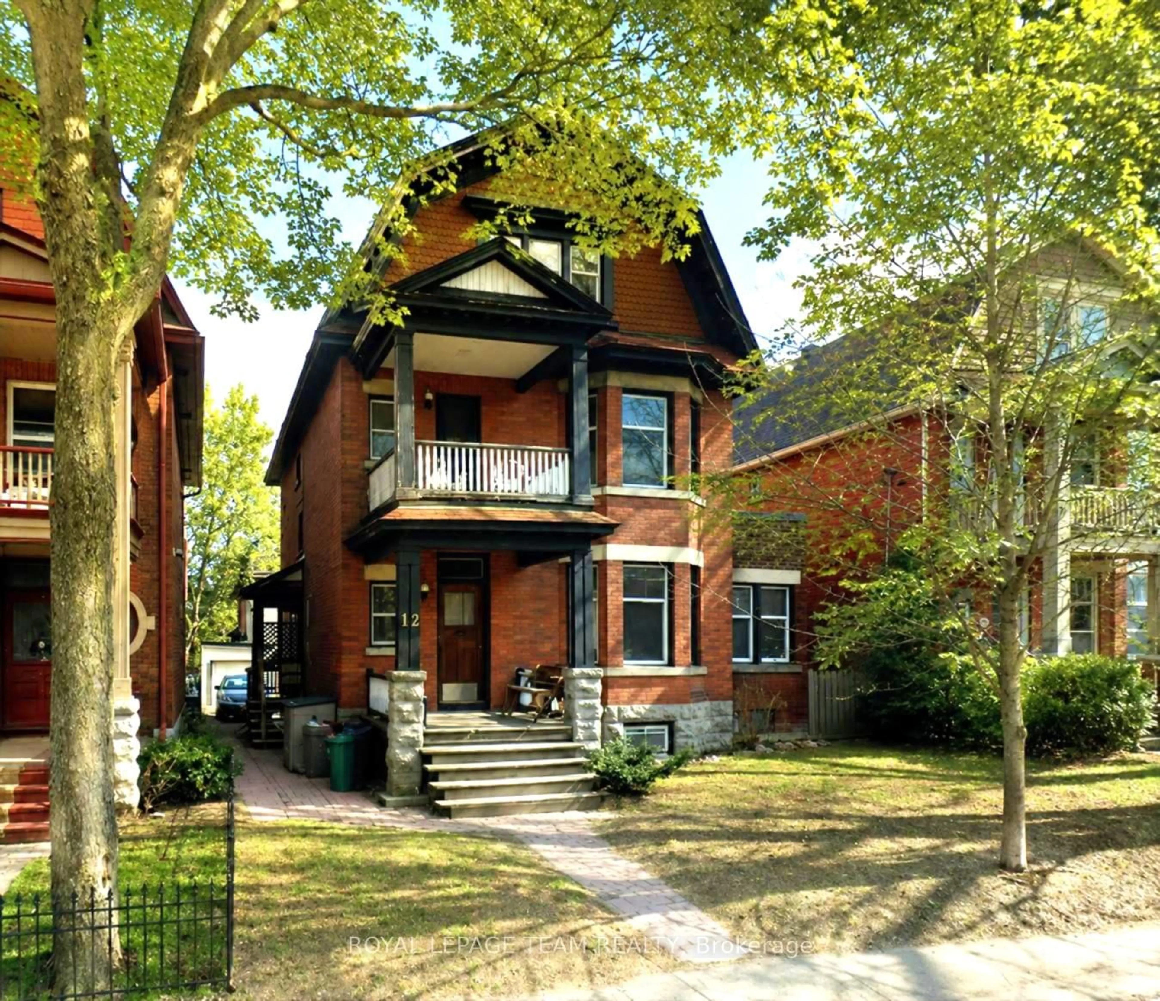 Home with brick exterior material, street for 12 Woodlawn Ave, Ottawa Ontario K1S 2S9