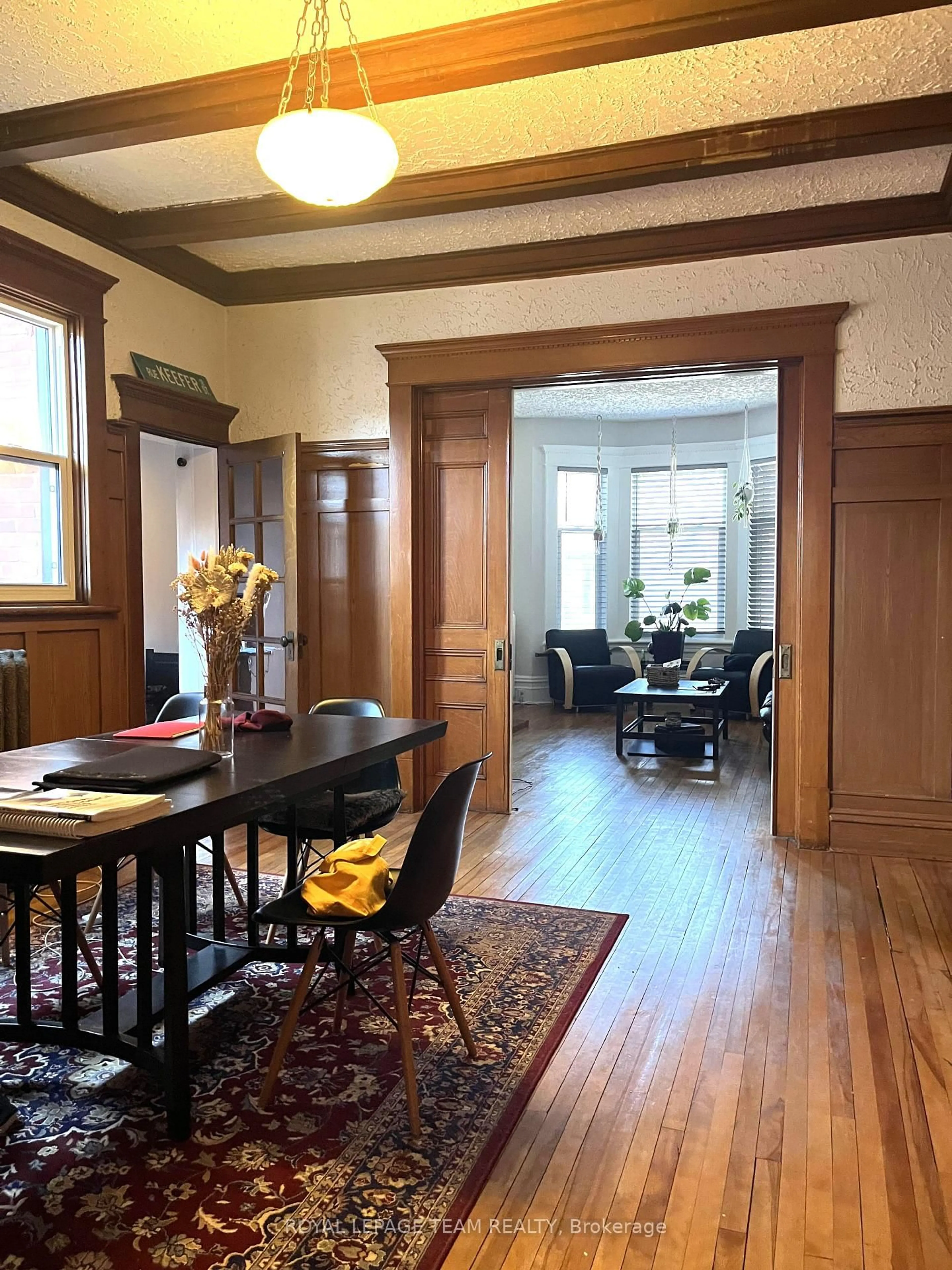 Dining room, wood/laminate floor for 12 Woodlawn Ave, Ottawa Ontario K1S 2S9
