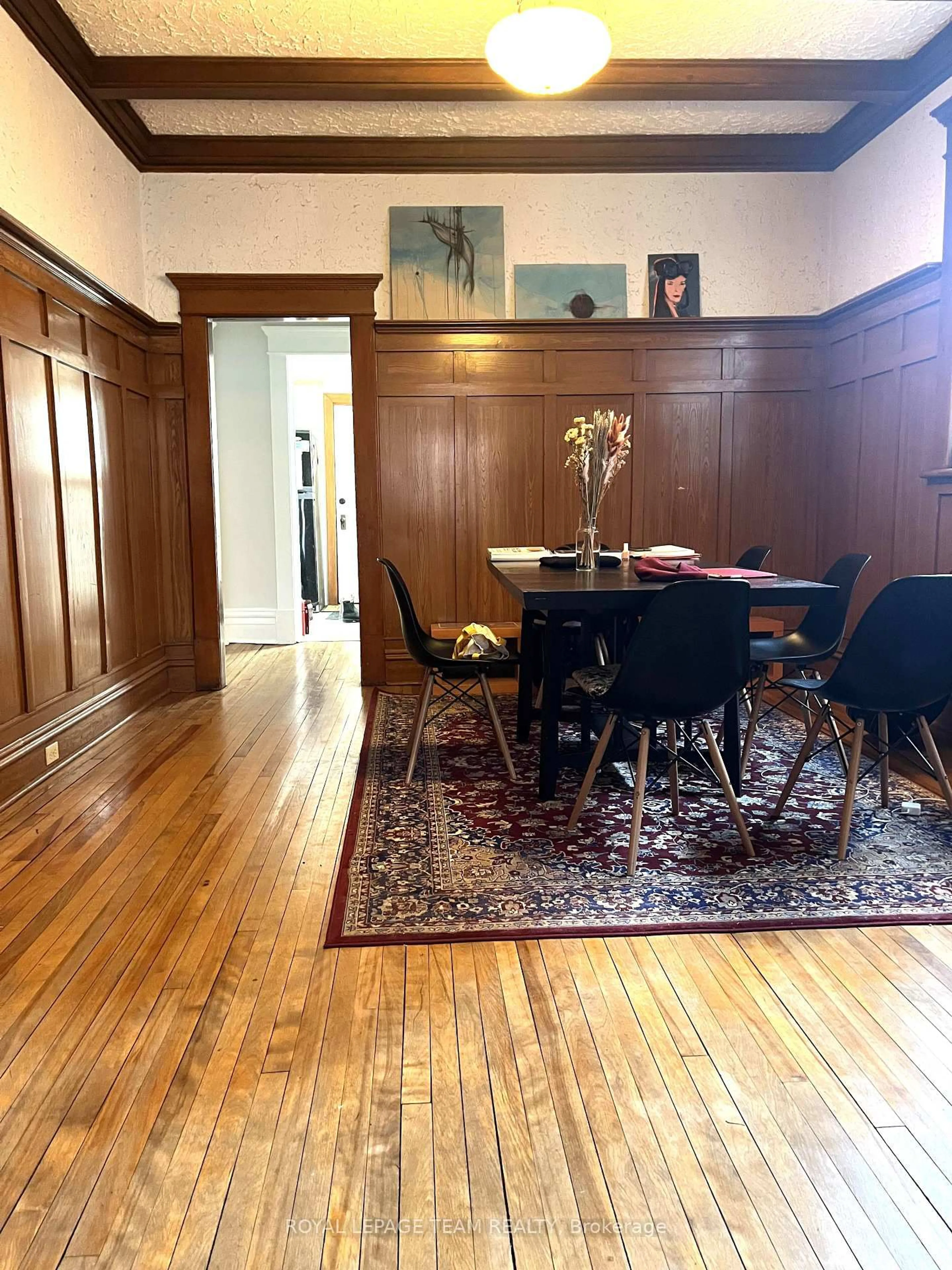 Dining room, wood/laminate floor for 12 Woodlawn Ave, Ottawa Ontario K1S 2S9