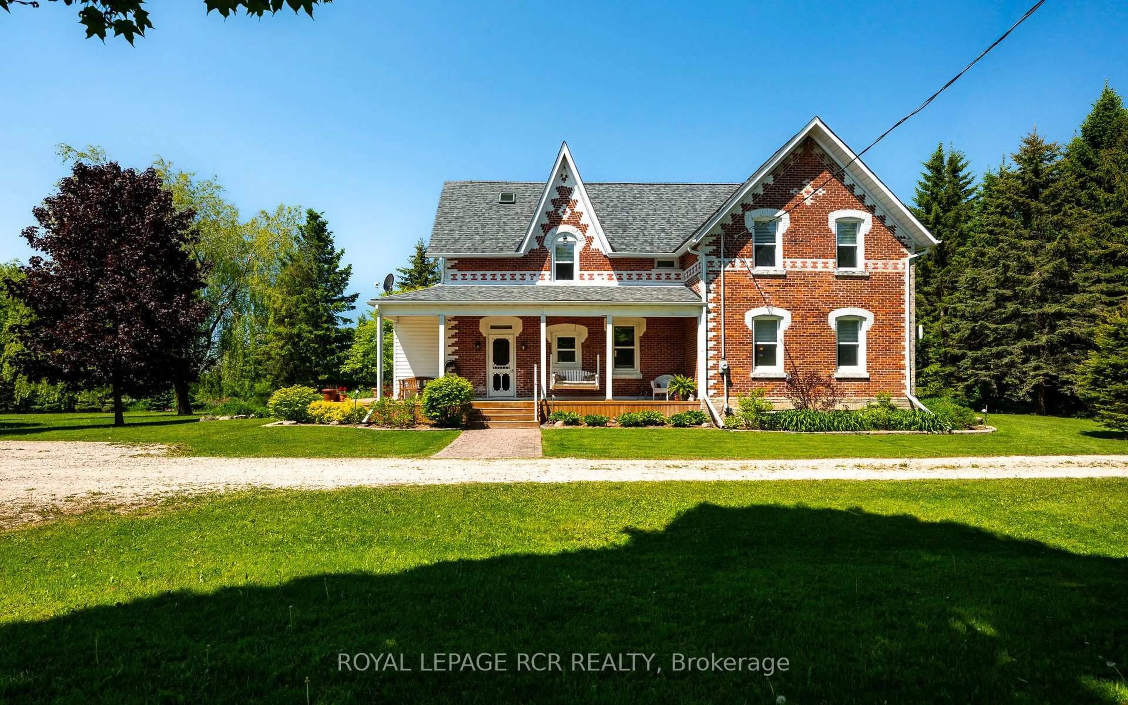 Home with brick exterior material, street for 126402 Southgate Road 12, Southgate Ontario N0C 1B0