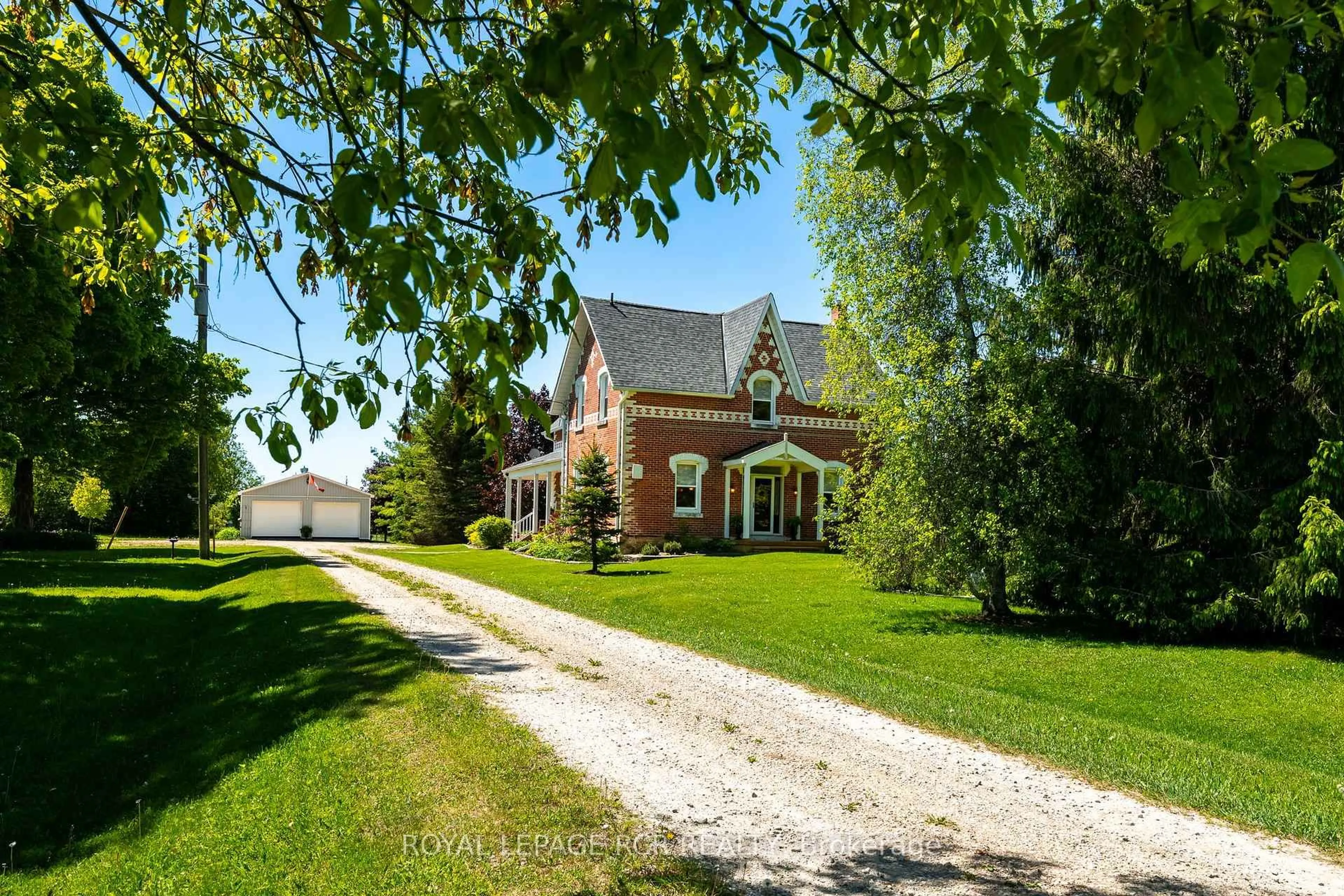 Home with brick exterior material, street for 126402 Southgate Road 12, Southgate Ontario N0C 1B0