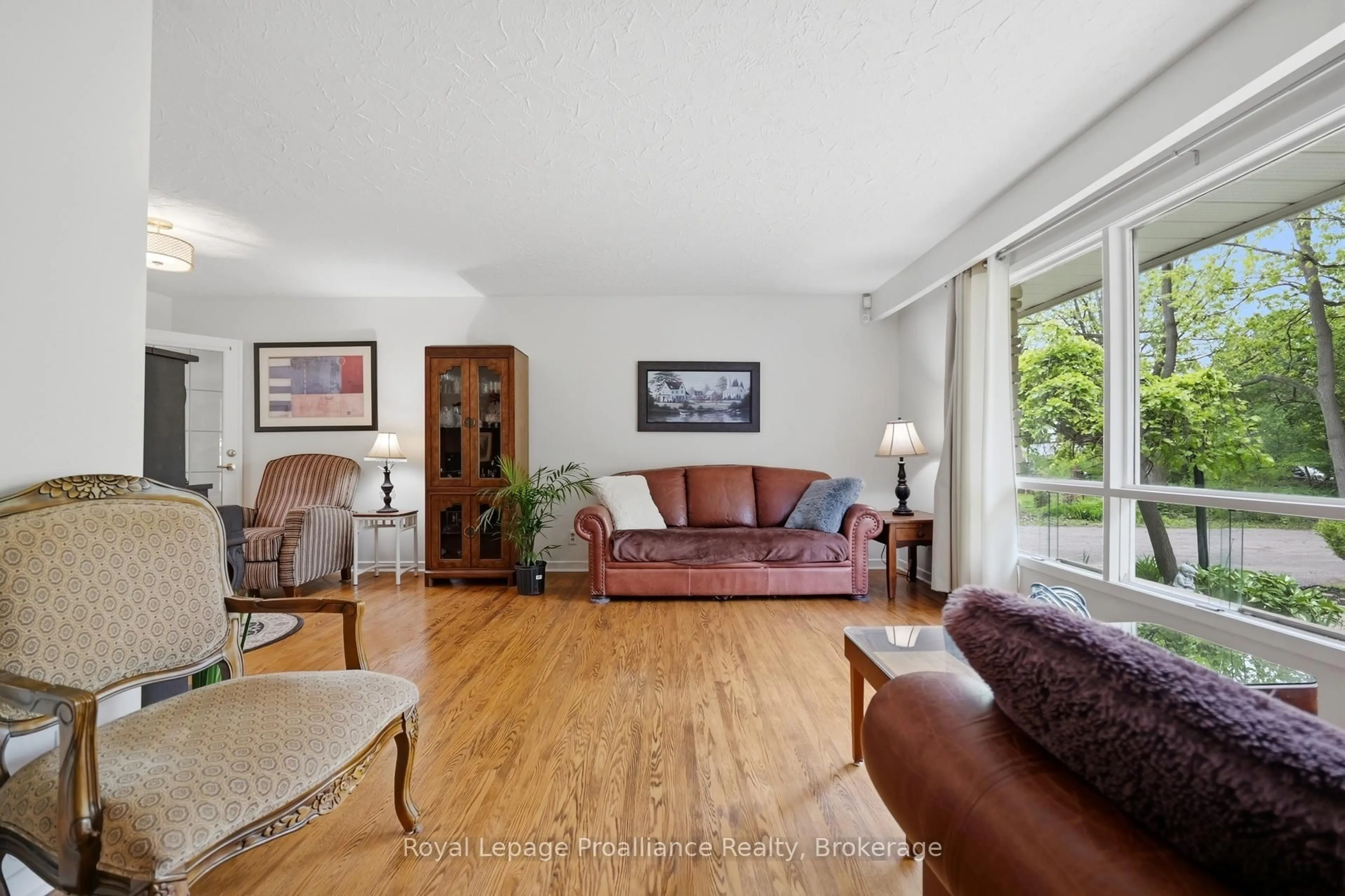 Living room with furniture, wood/laminate floor for 51 Selena Ave, Belleville Ontario K8P 4C5