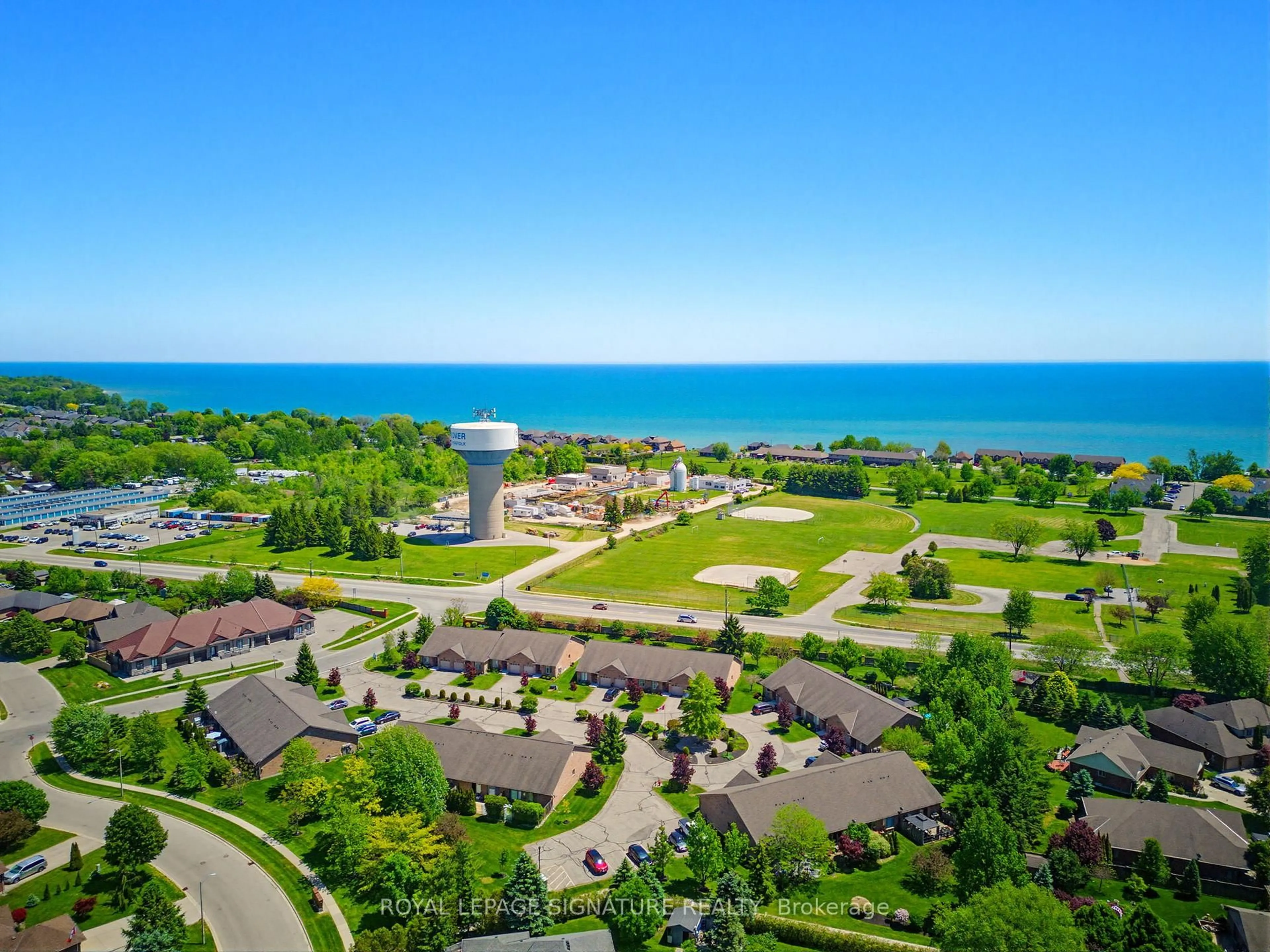 A pic from outside/outdoor area/front of a property/back of a property/a pic from drone, water/lake/river/ocean view for 5 Coastal Crt, Norfolk Ontario N0A 1N7