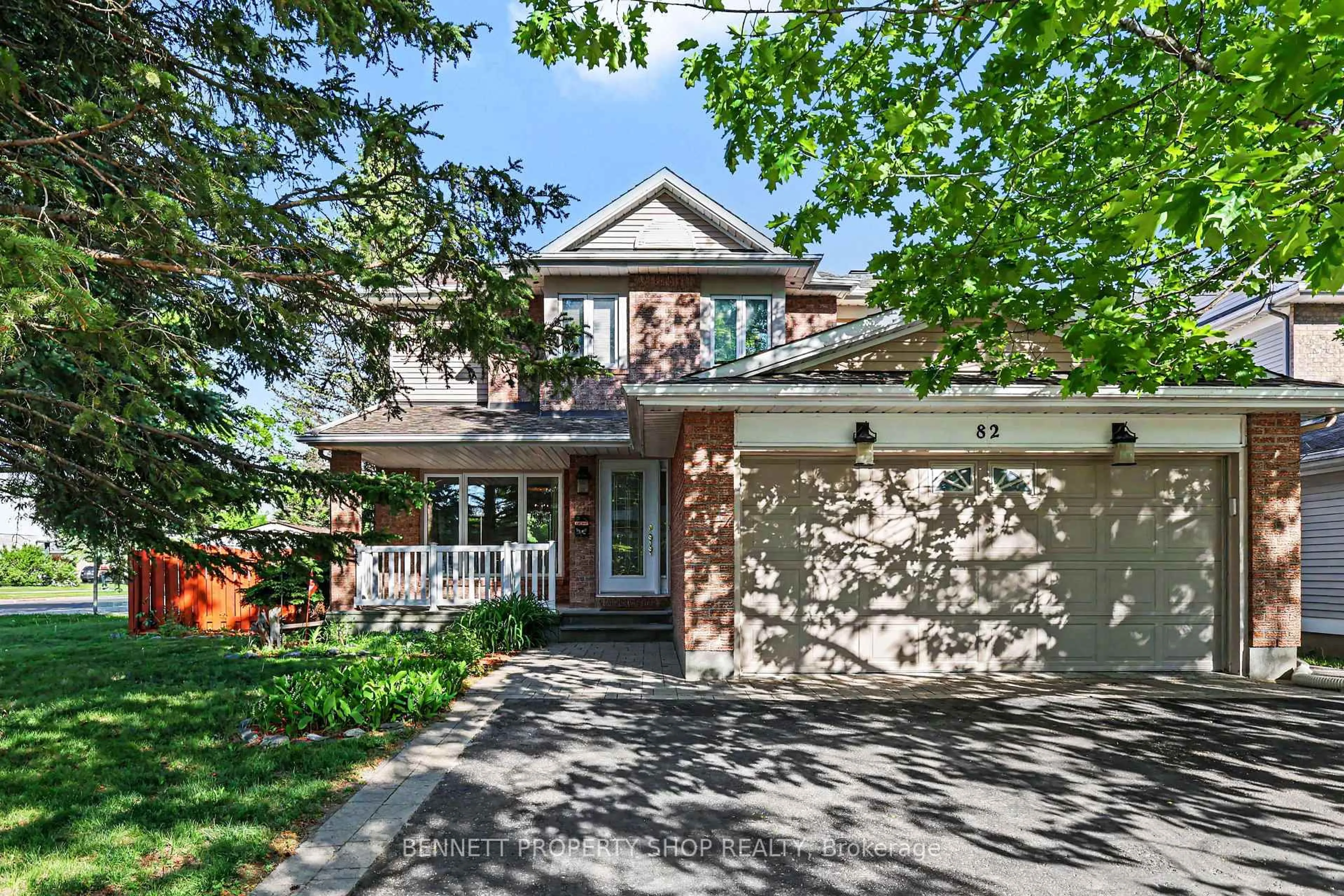 Home with brick exterior material, street for 82 Emerald Meadows Dr, Ottawa Ontario K2M 2L6