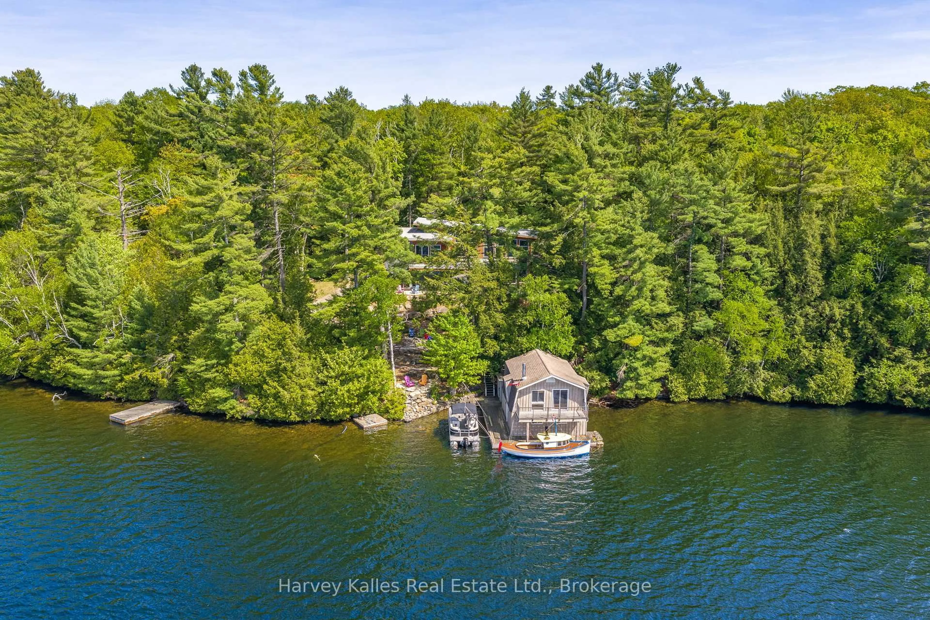 A pic from outside/outdoor area/front of a property/back of a property/a pic from drone, water/lake/river/ocean view for 43 Houston Lane, Seguin Ontario P2A 0B2