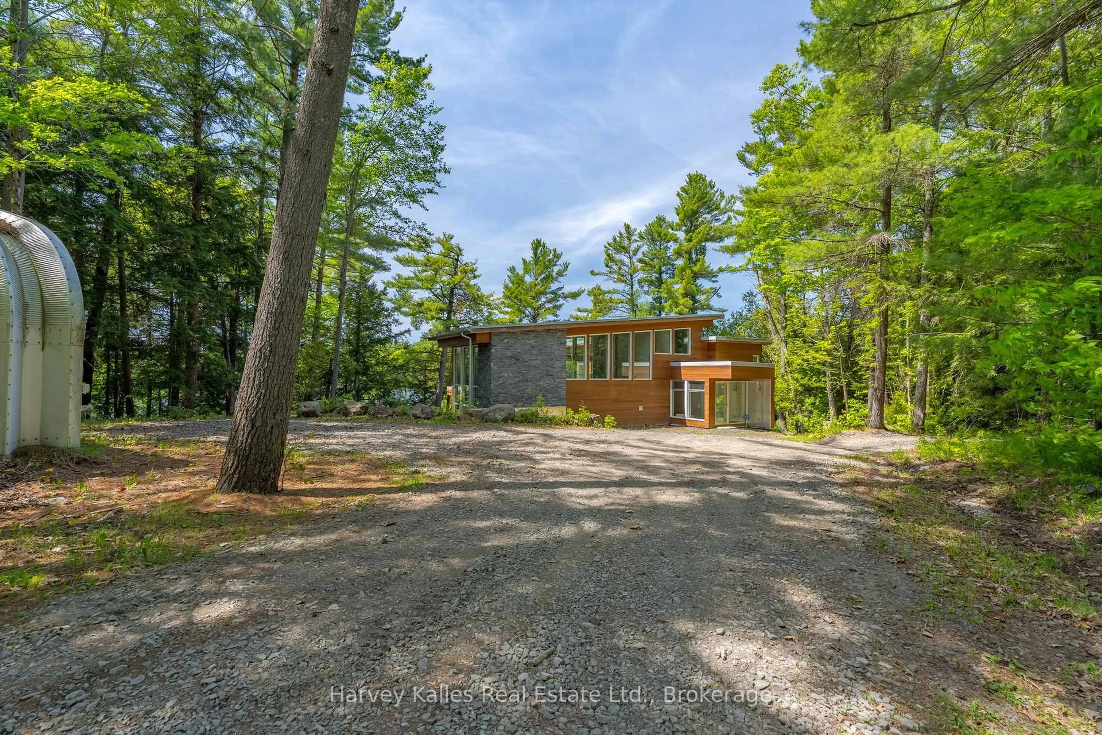 A pic from outside/outdoor area/front of a property/back of a property/a pic from drone, forest/trees view for 43 Houston Lane, Seguin Ontario P2A 0B2