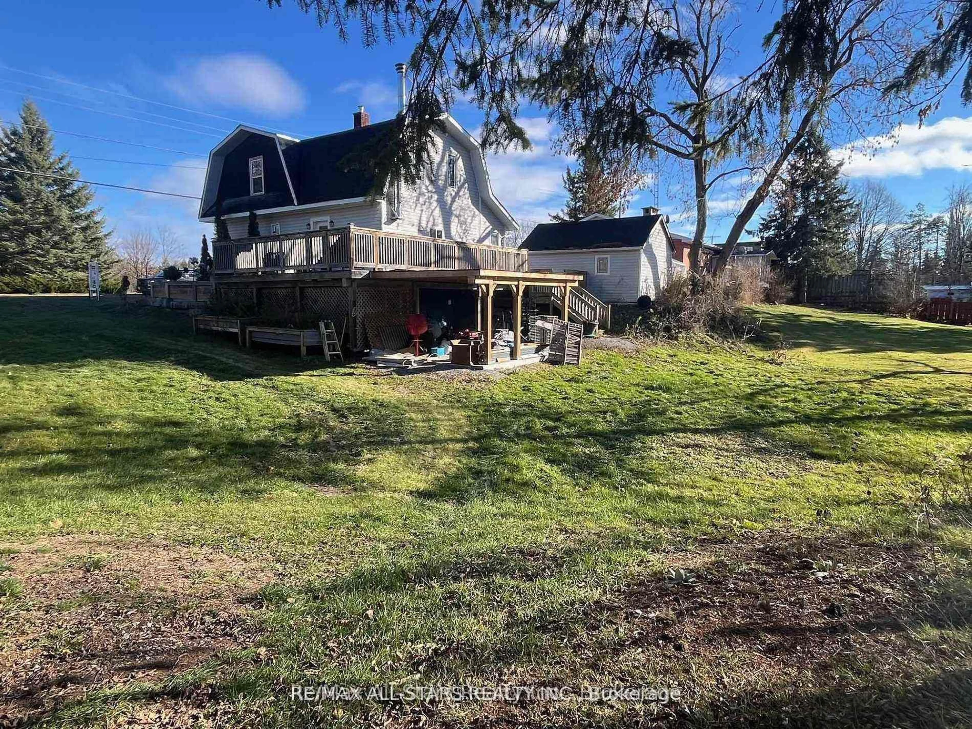 A pic from outside/outdoor area/front of a property/back of a property/a pic from drone, unknown for 211 Burnt River Rd, Kawartha Lakes Ontario K0M 1C0