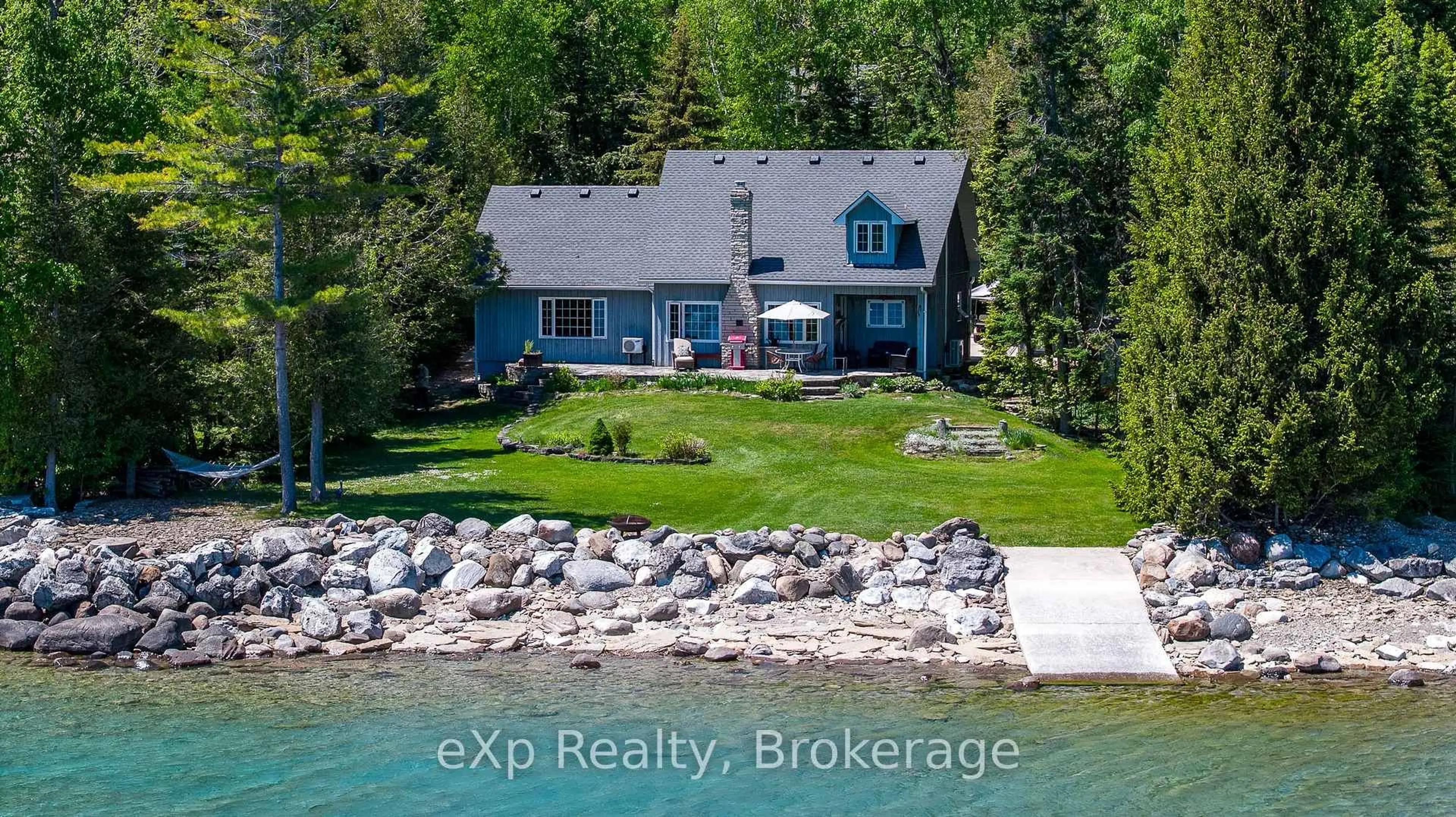 A pic from outside/outdoor area/front of a property/back of a property/a pic from drone, water/lake/river/ocean view for 504615 Grey Road 1, Georgian Bluffs Ontario N0H 2T0