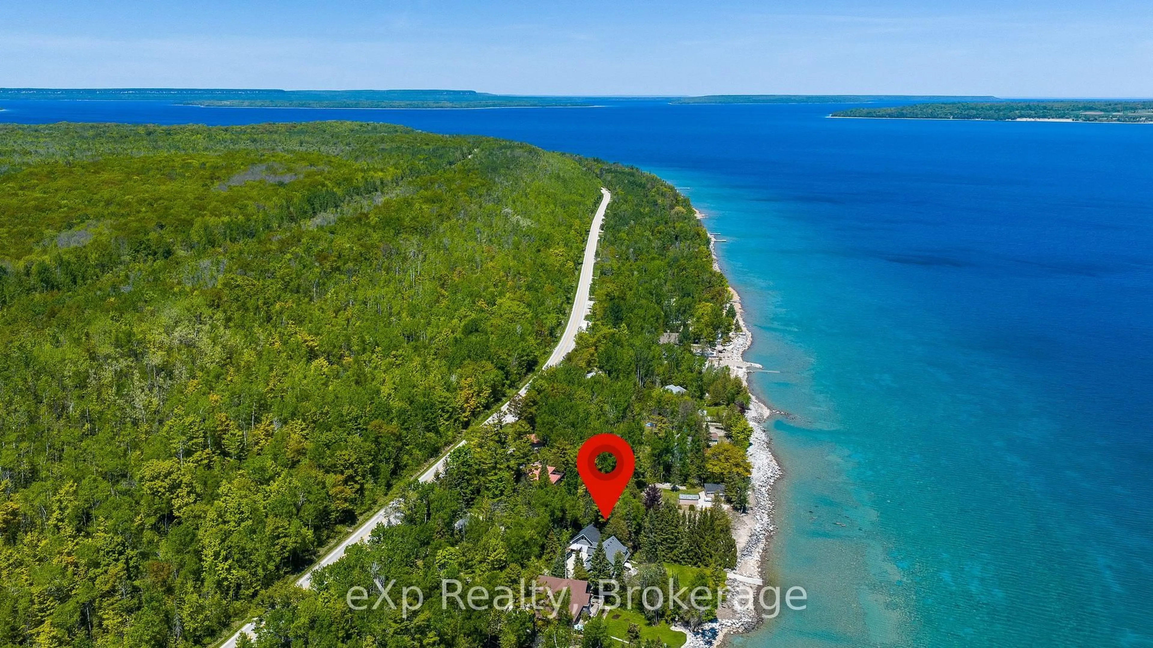 A pic from outside/outdoor area/front of a property/back of a property/a pic from drone, water/lake/river/ocean view for 504615 Grey Road 1, Georgian Bluffs Ontario N0H 2T0