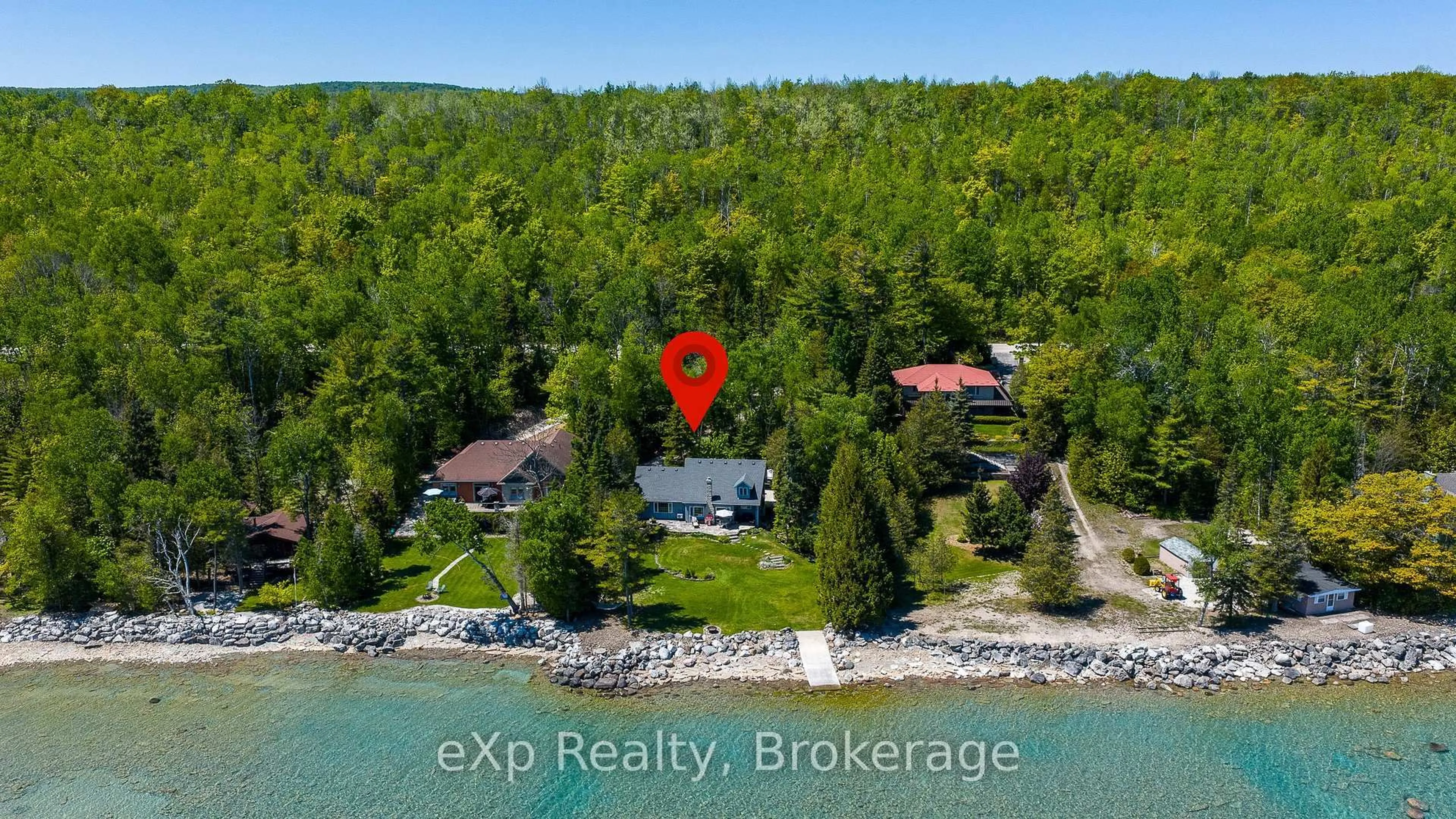 A pic from outside/outdoor area/front of a property/back of a property/a pic from drone, water/lake/river/ocean view for 504615 Grey Road 1, Georgian Bluffs Ontario N0H 2T0