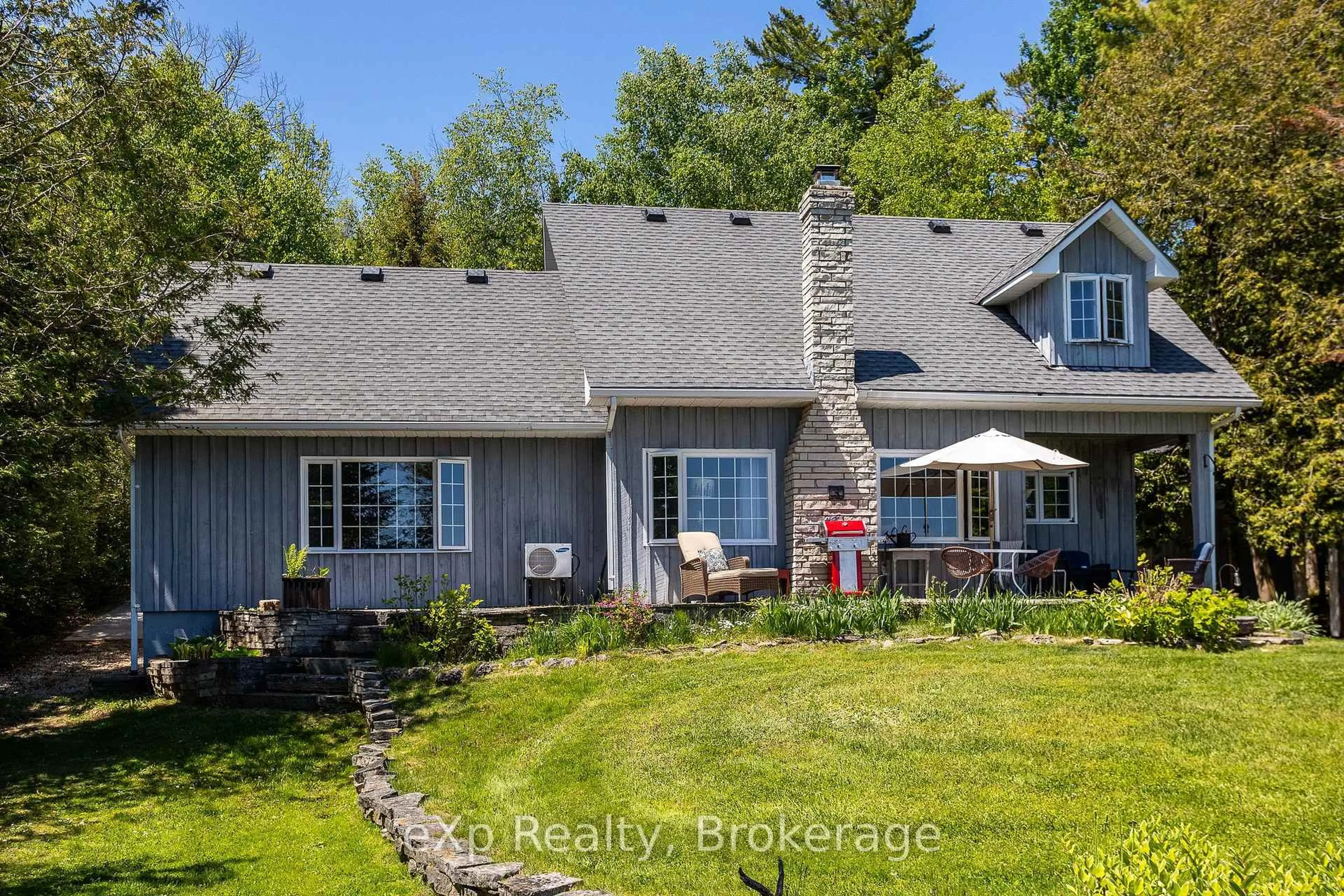 A pic from outside/outdoor area/front of a property/back of a property/a pic from drone, water/lake/river/ocean view for 504615 Grey Road 1, Georgian Bluffs Ontario N0H 2T0