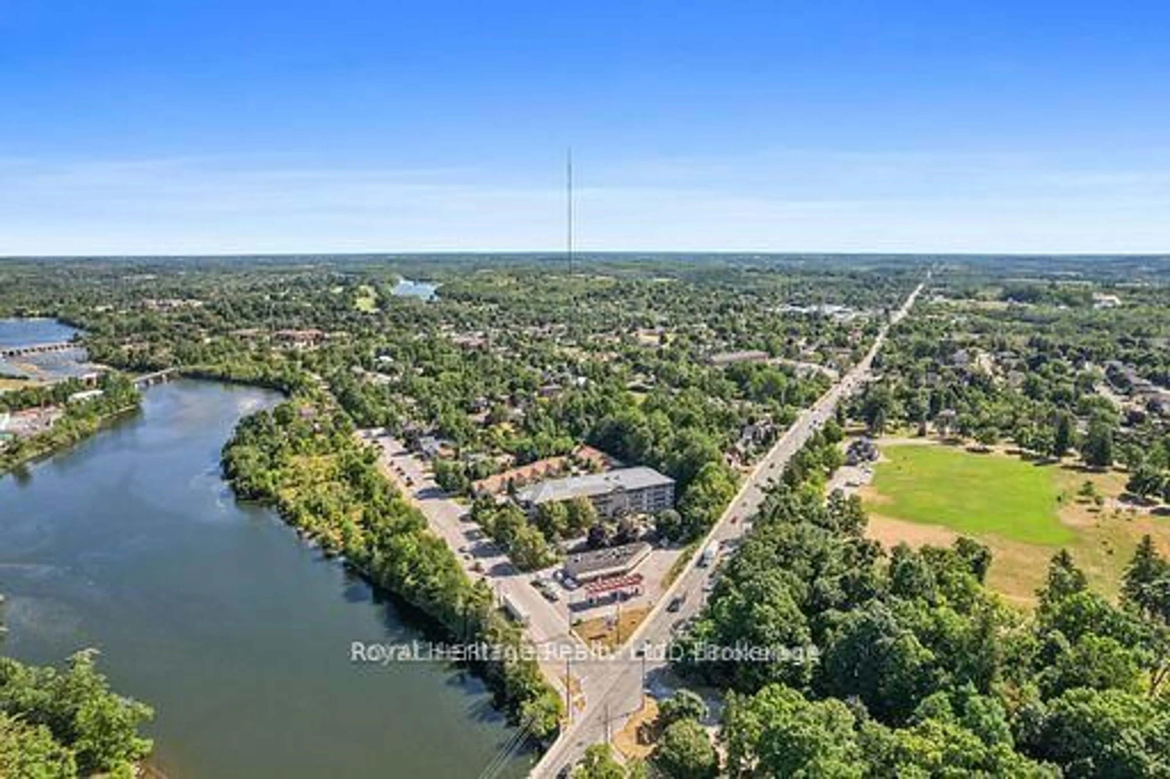 A pic from outside/outdoor area/front of a property/back of a property/a pic from drone, water/lake/river/ocean view for 40 Auburn St #211, Peterborough Ontario K9H 2G2