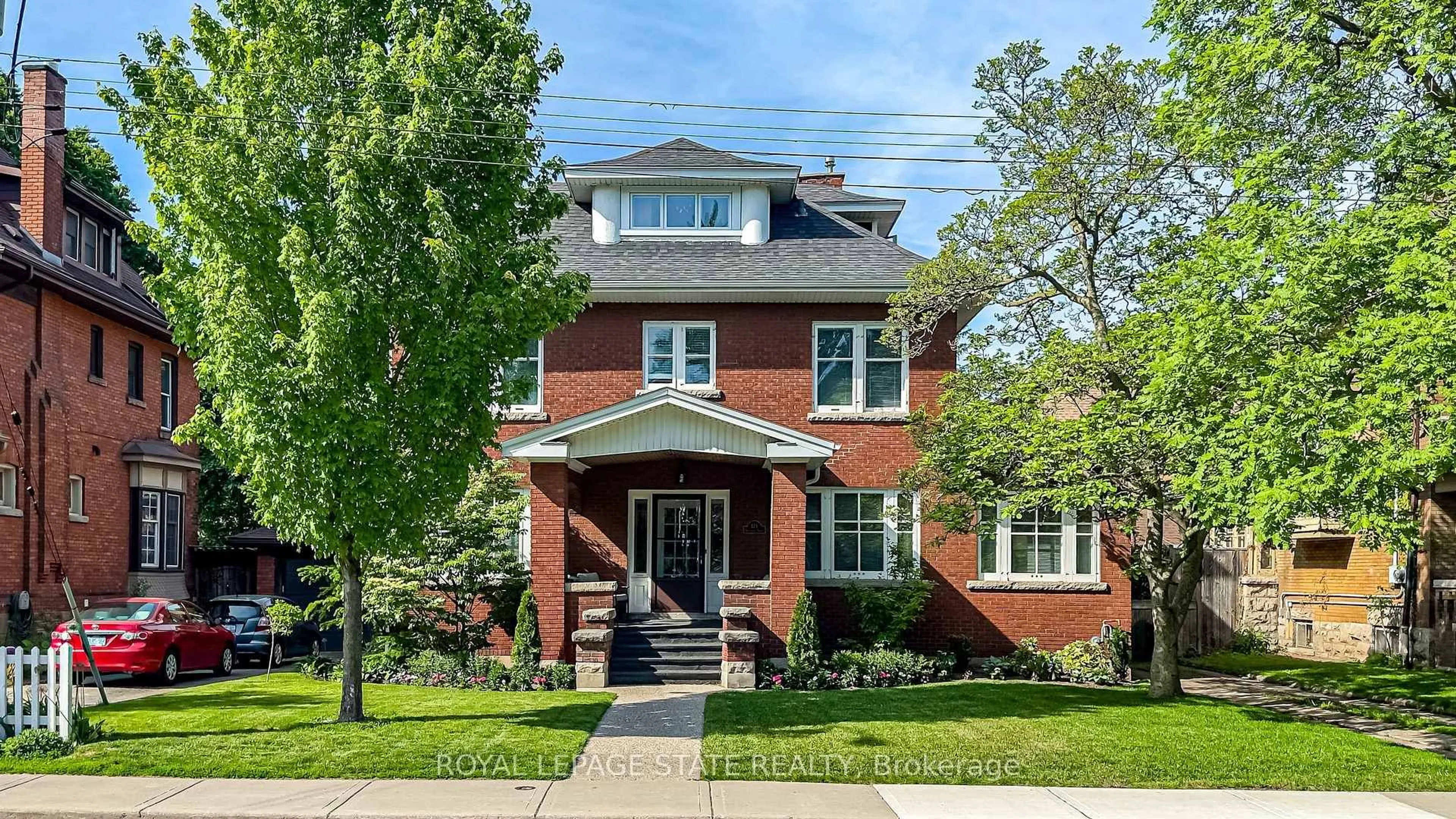 Home with brick exterior material, street for 125 Delaware Ave, Hamilton Ontario L8M 1V2