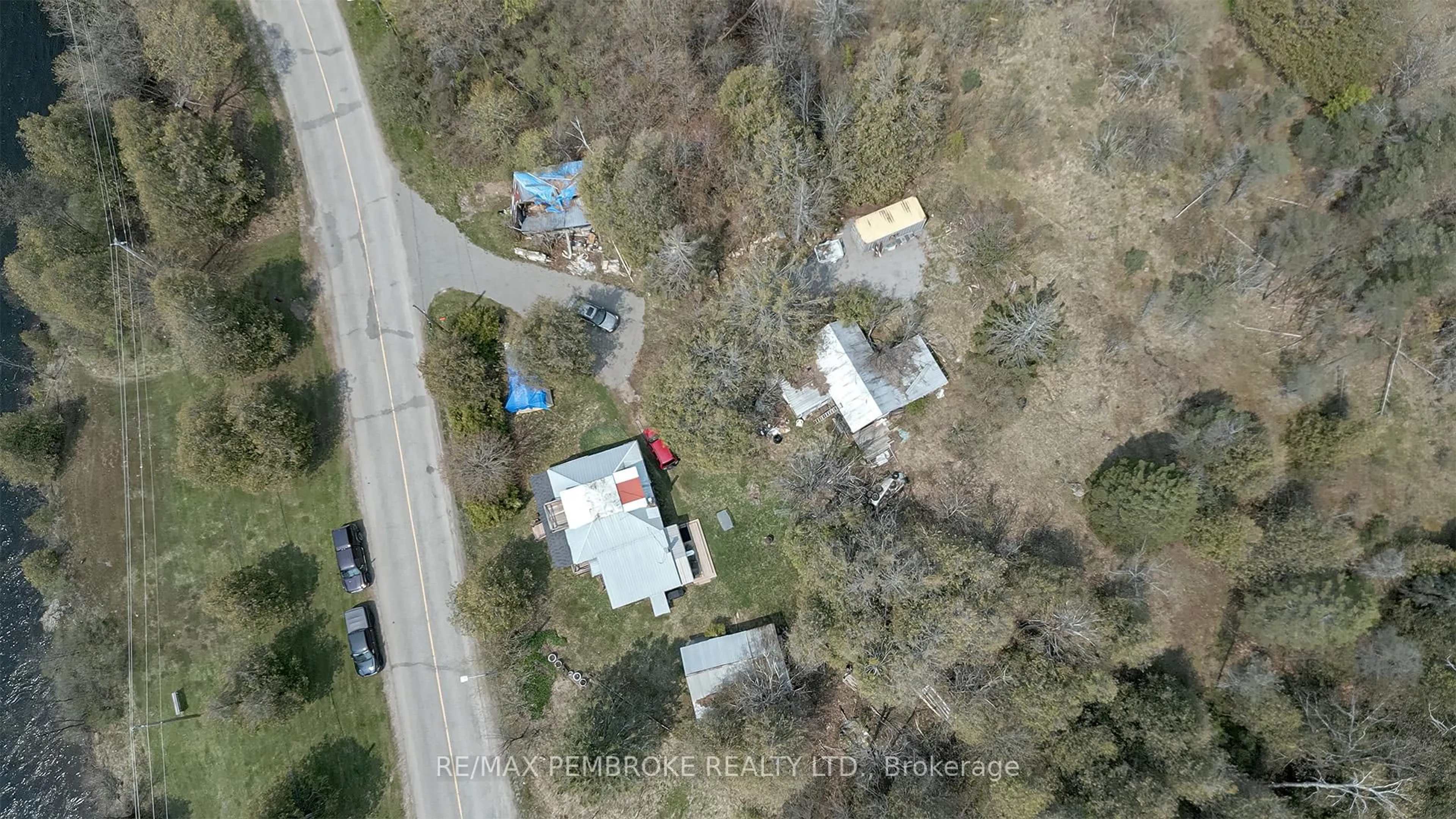 A pic from outside/outdoor area/front of a property/back of a property/a pic from drone, street for 1746 Mill St, Eganville Ontario K0J 1T0