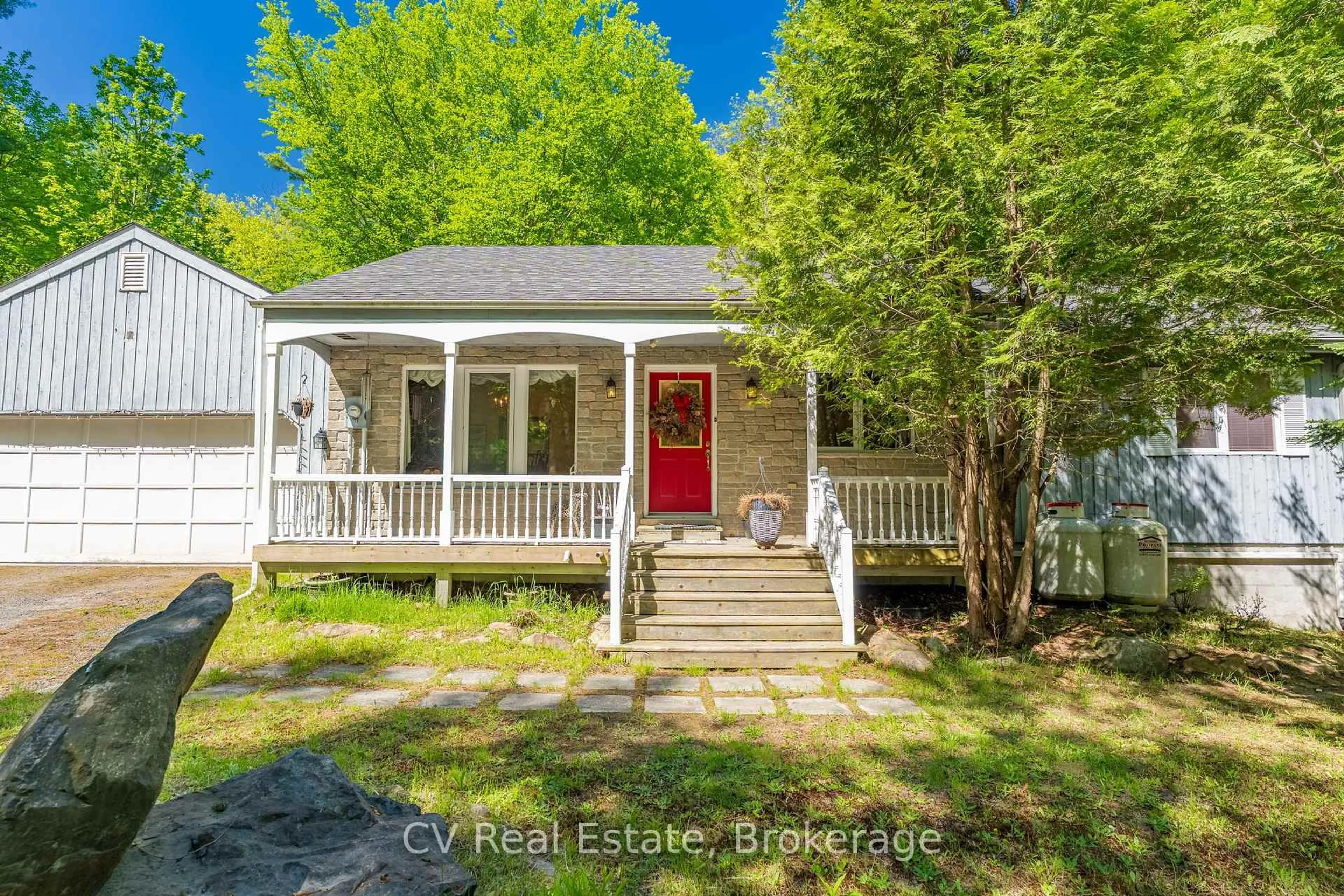 A pic from outside/outdoor area/front of a property/back of a property/a pic from drone, street for 16 Breisacher Rd, Huntsville Ontario P1H 2N5