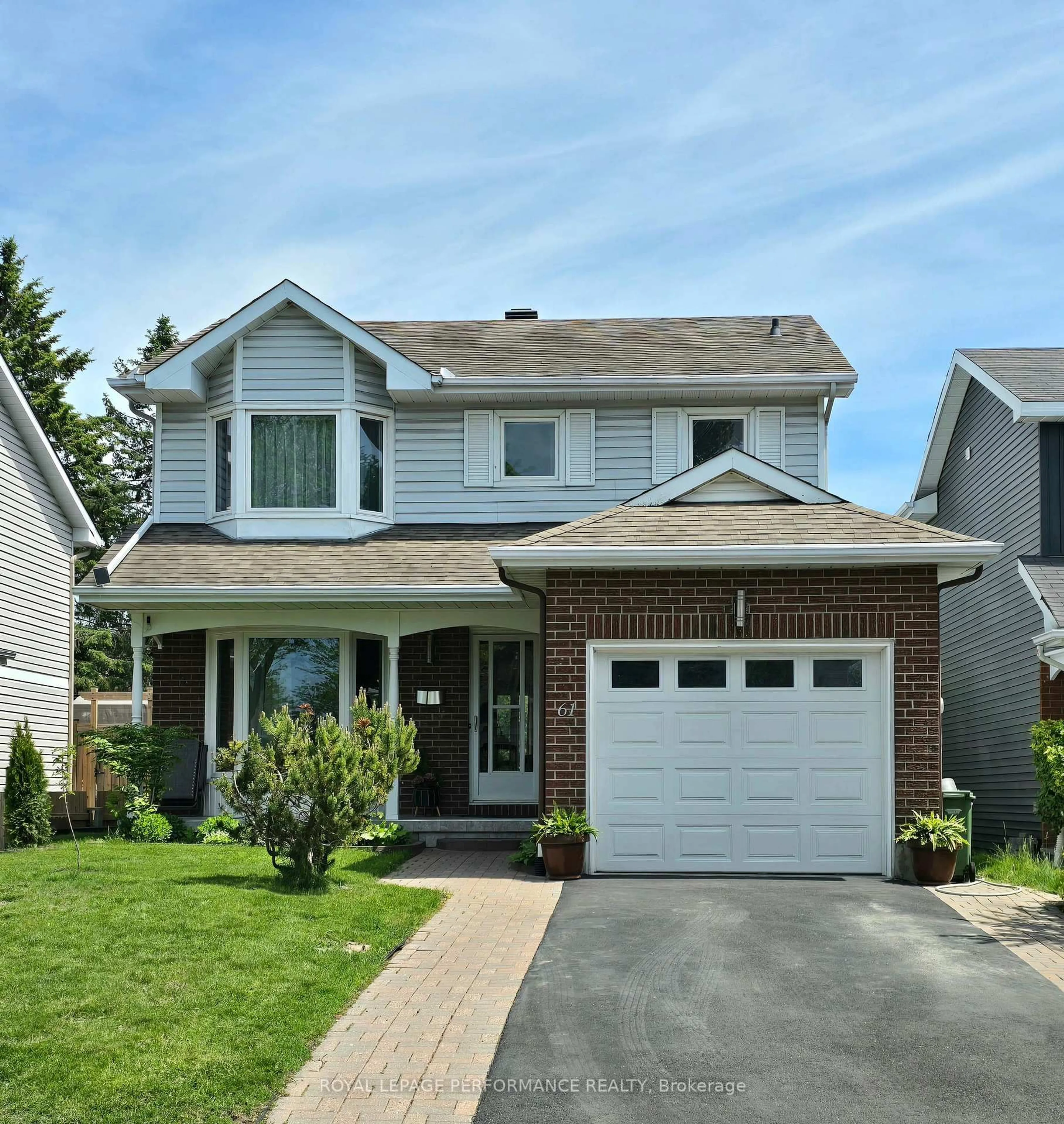 Home with vinyl exterior material, street for 61 Hawley Cres, Kanata Ontario K2M 1T4