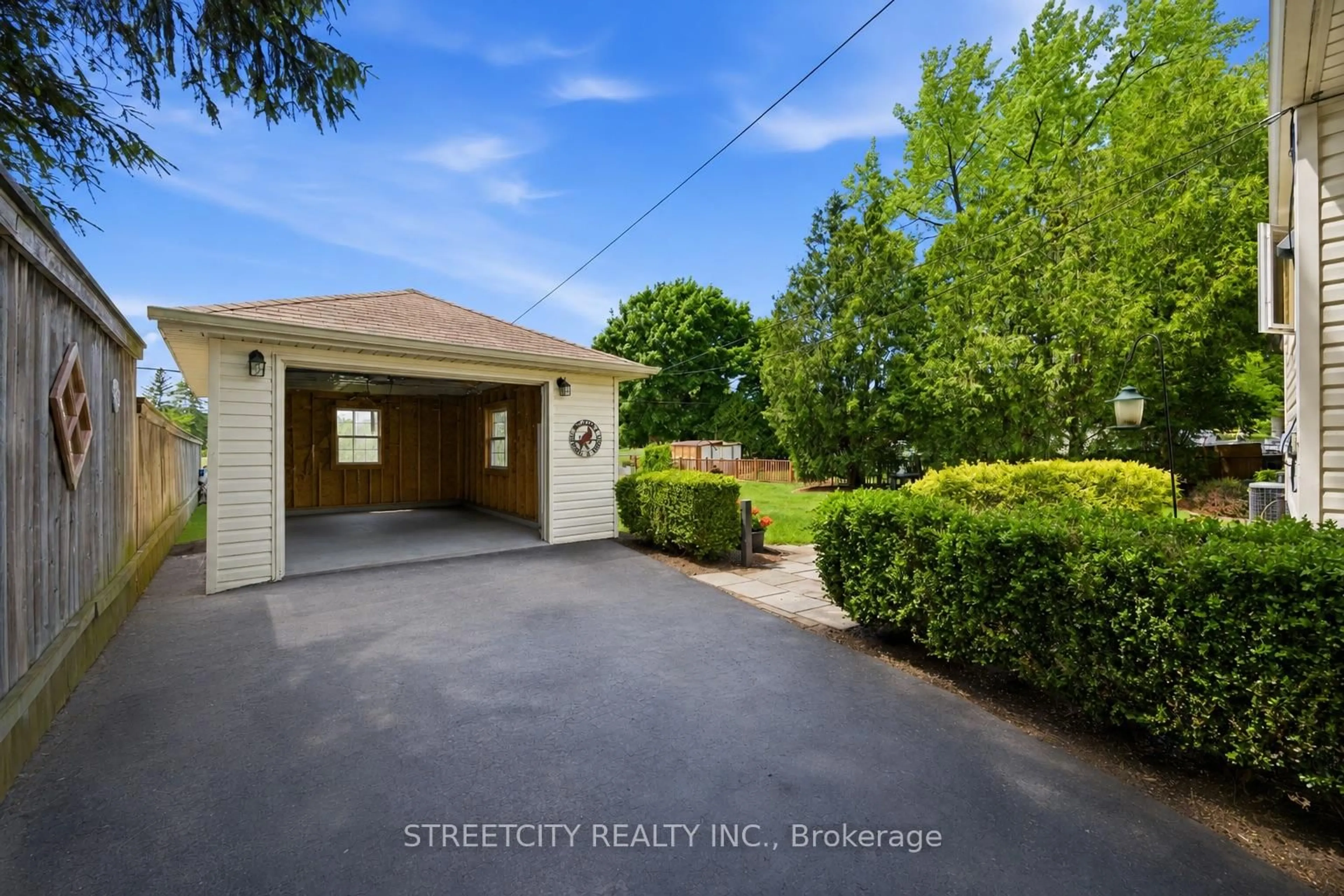 A pic from outside/outdoor area/front of a property/back of a property/a pic from drone, street for 893 Hollands Ave, Sarnia Ontario N7S 3B9