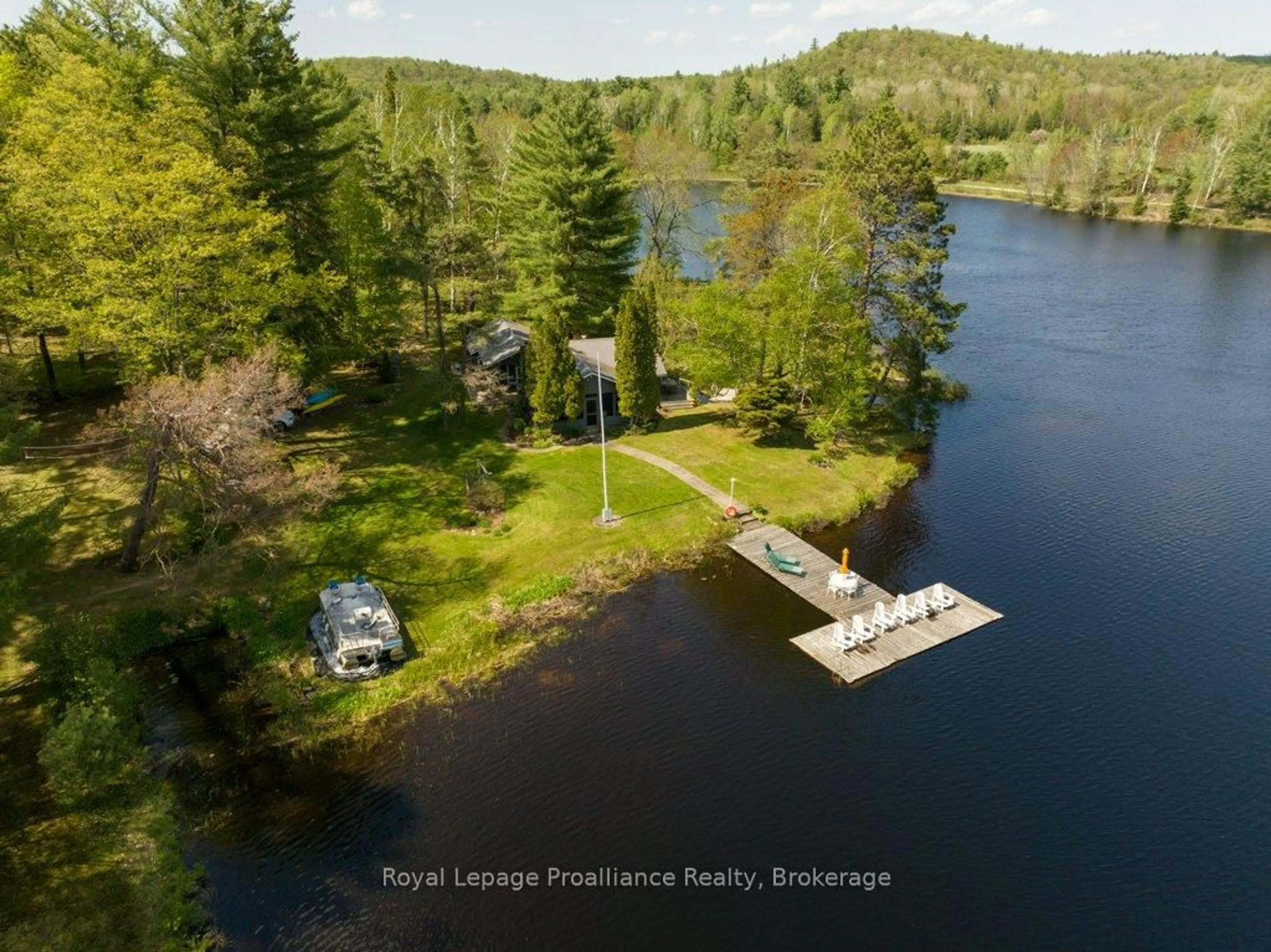 A pic from outside/outdoor area/front of a property/back of a property/a pic from drone, water/lake/river/ocean view for 17833 Highway 41, Cloyne Ontario K0H 1K0