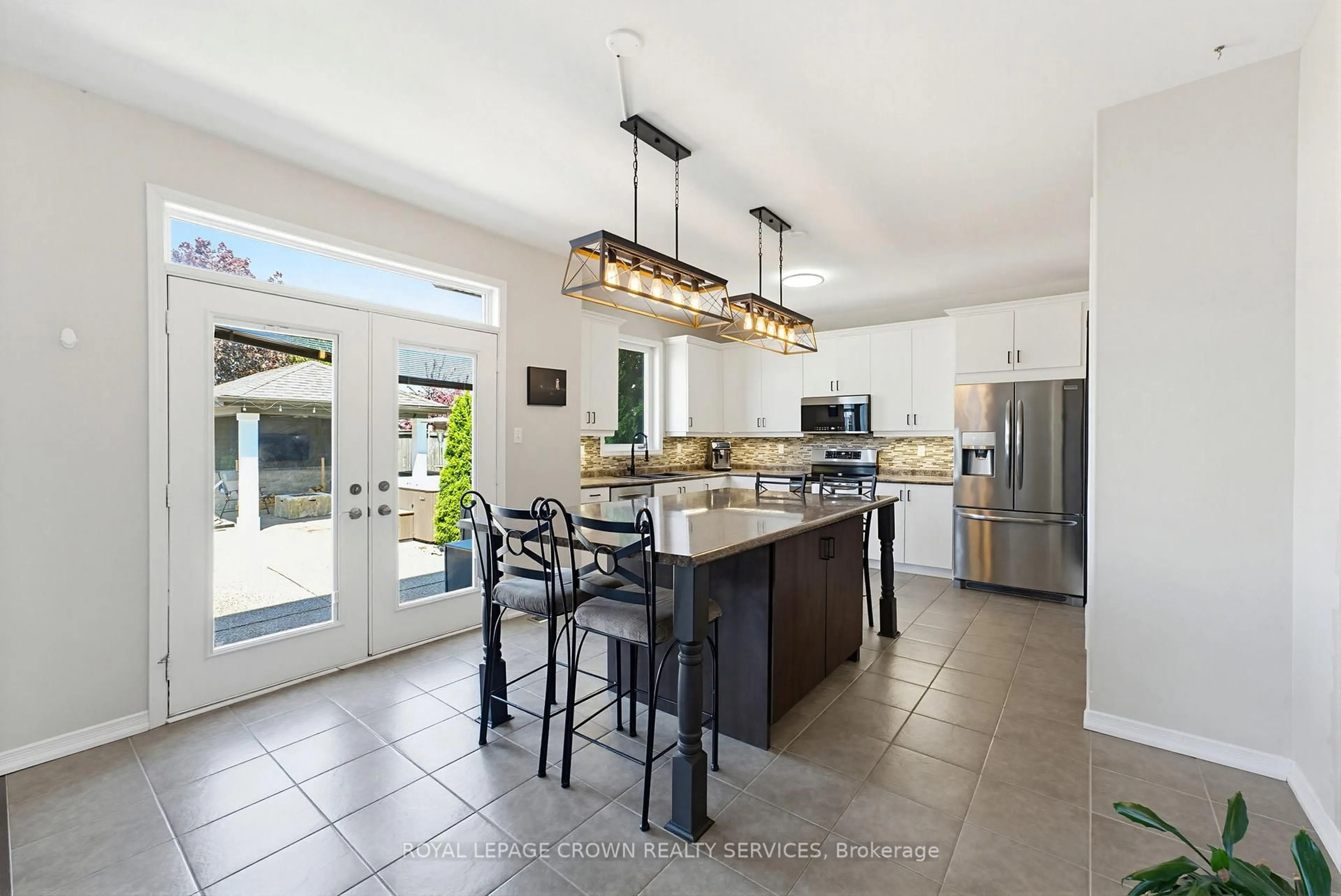 Open concept kitchen, ceramic/tile floor for 14 Reading St, Woolwich Ontario N0B 1M0