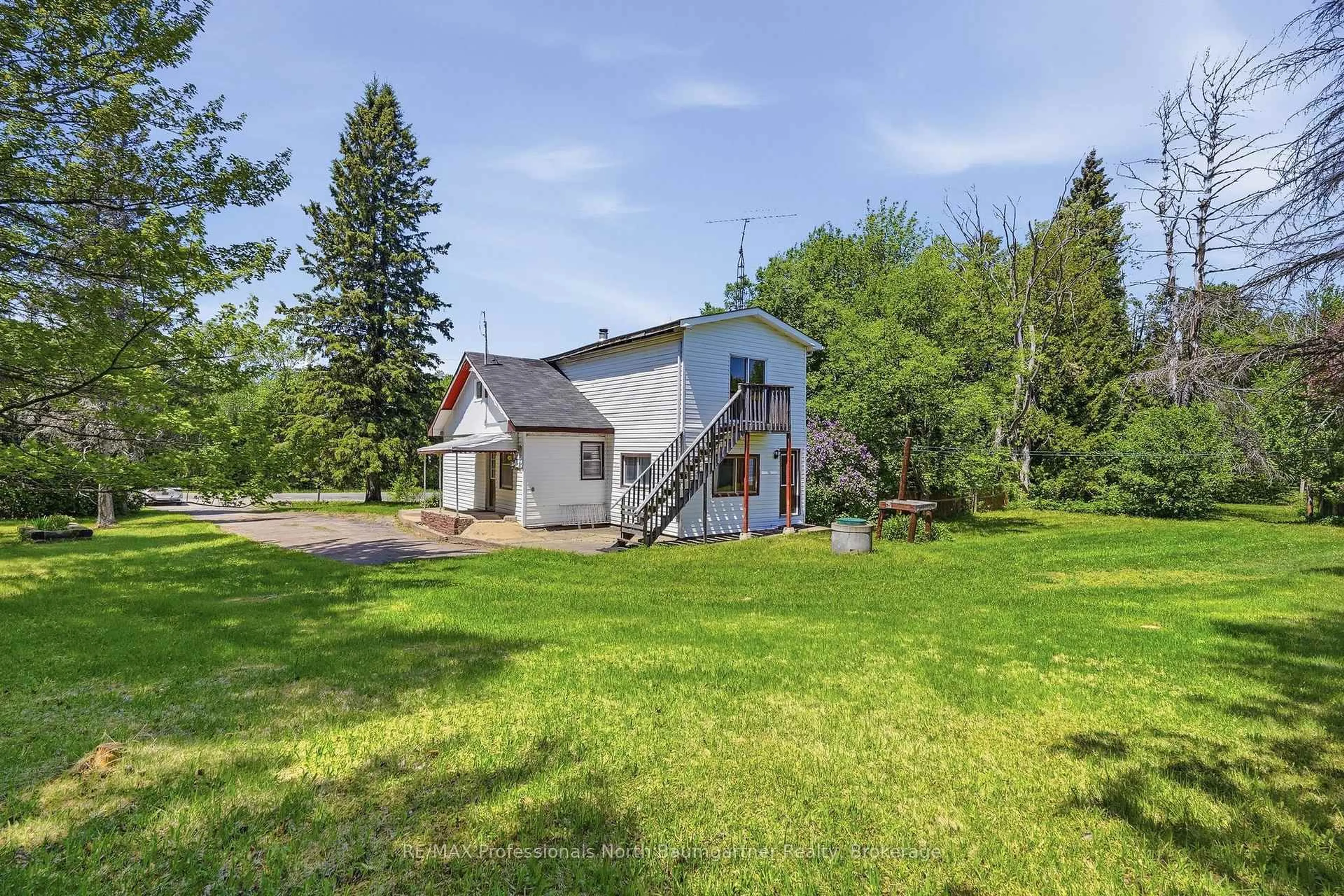 A pic from outside/outdoor area/front of a property/back of a property/a pic from drone, unknown for 6189 Loop Rd, Highlands East Ontario K0L 2A0