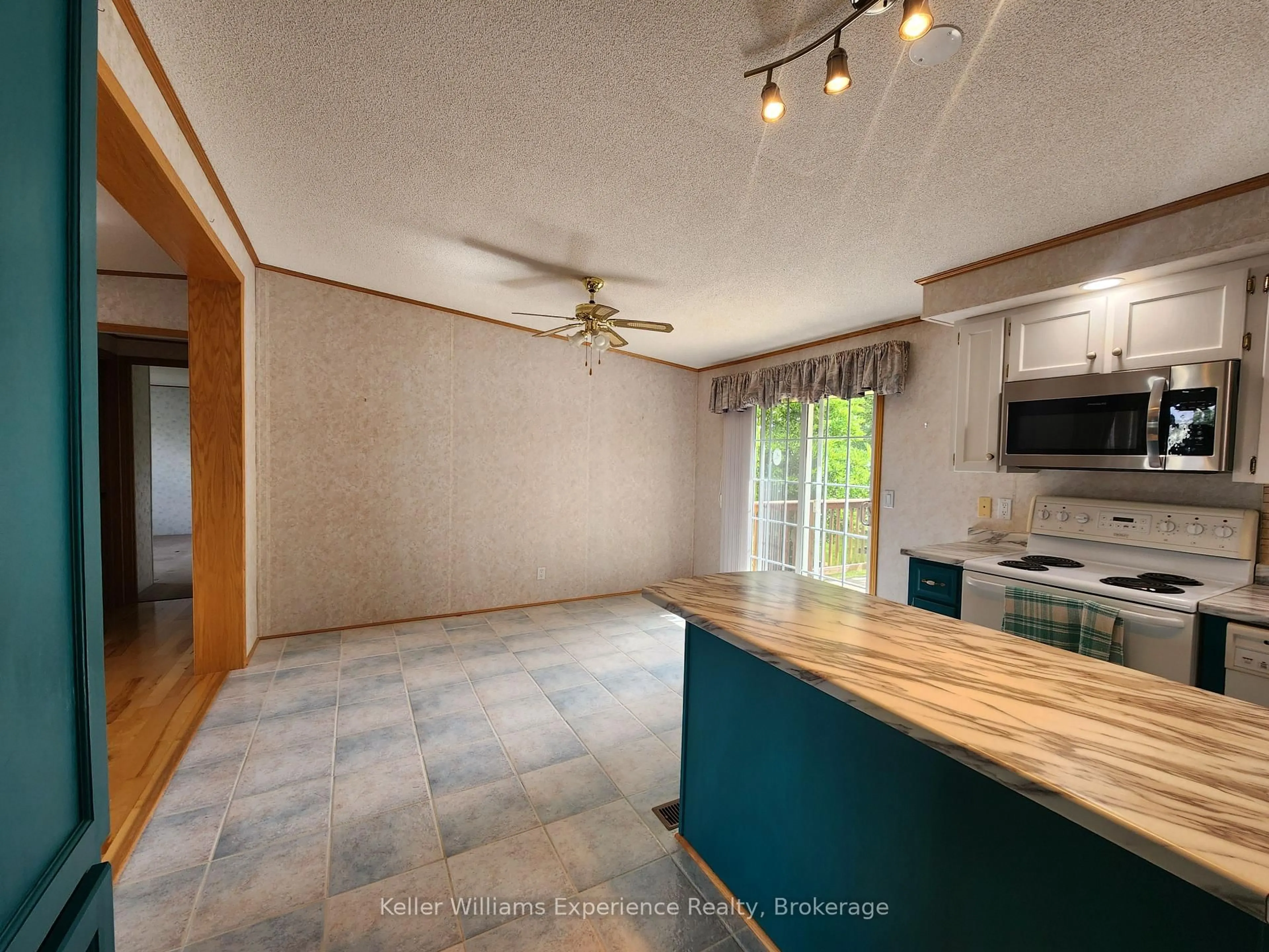 Open concept kitchen, unknown for 6512 Minto Line 12 #J-24, Minto Ontario N0G 1M0