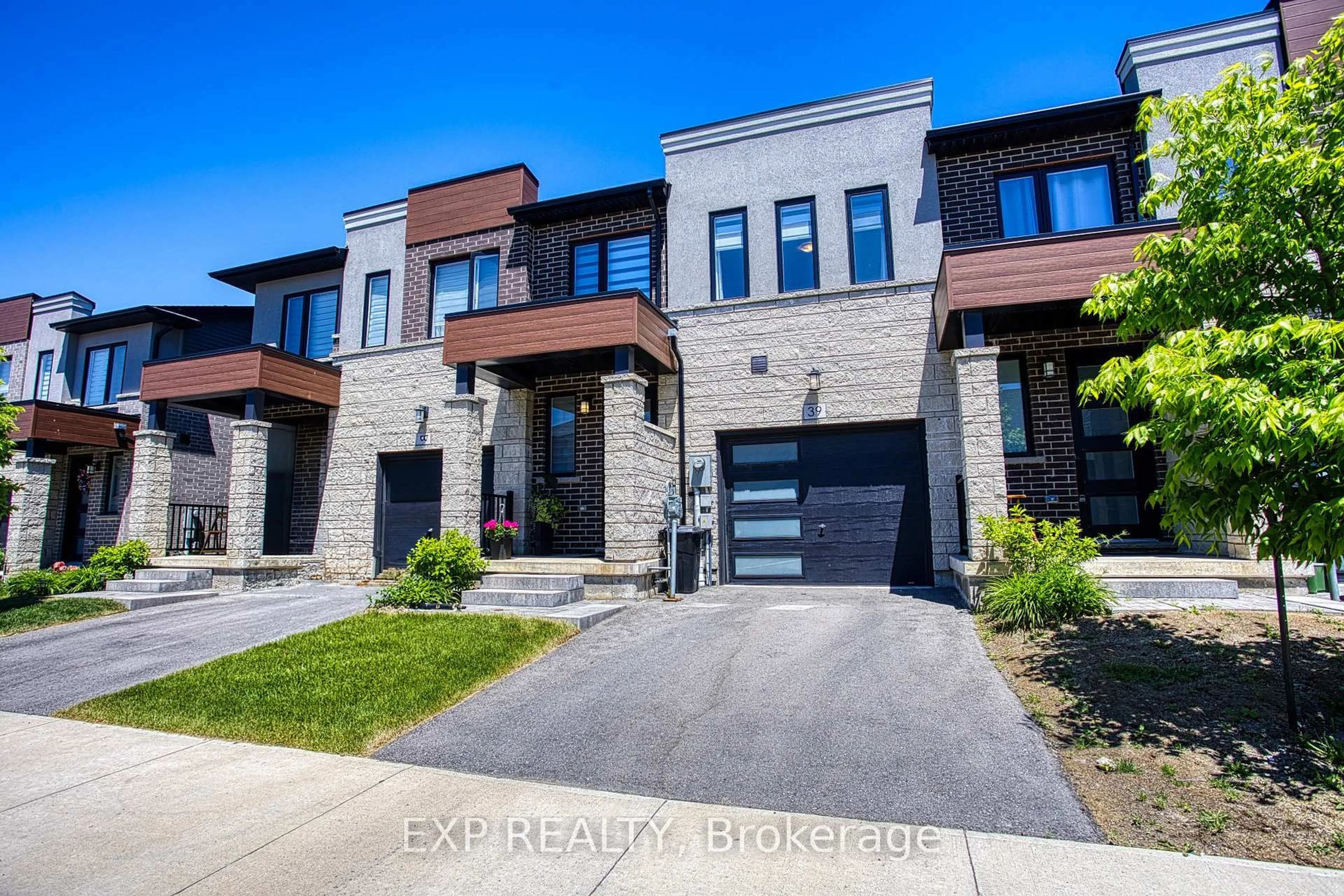 Home with brick exterior material, street for 39 Bensley Lane, Hamilton Ontario L9C 0E9