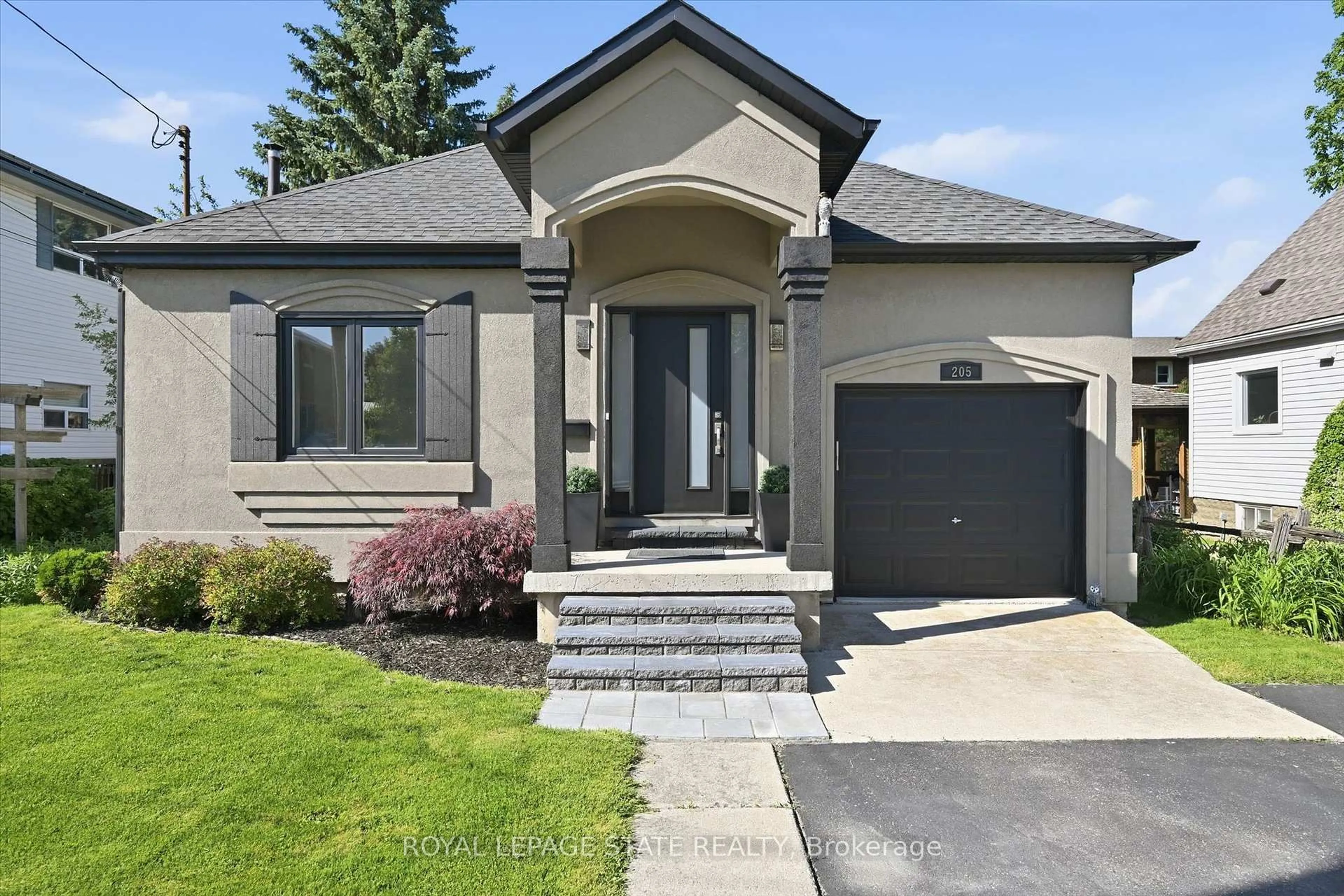 Home with brick exterior material, street for 205 Dumbarton Ave, Hamilton Ontario L8K 5C2