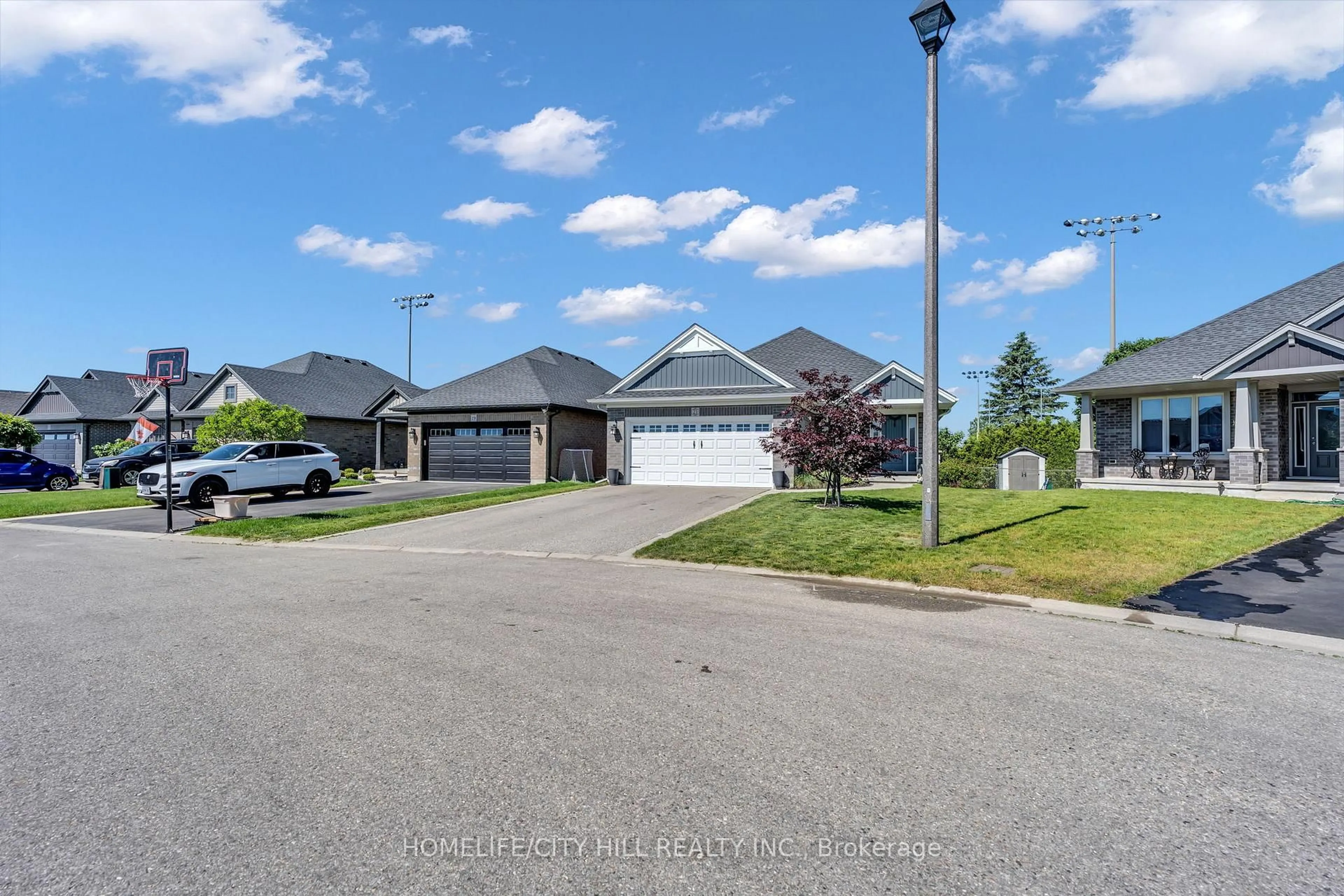 A pic from outside/outdoor area/front of a property/back of a property/a pic from drone, street for 21 Nancy Crt, Tillsonburg Ontario N4G 0G3