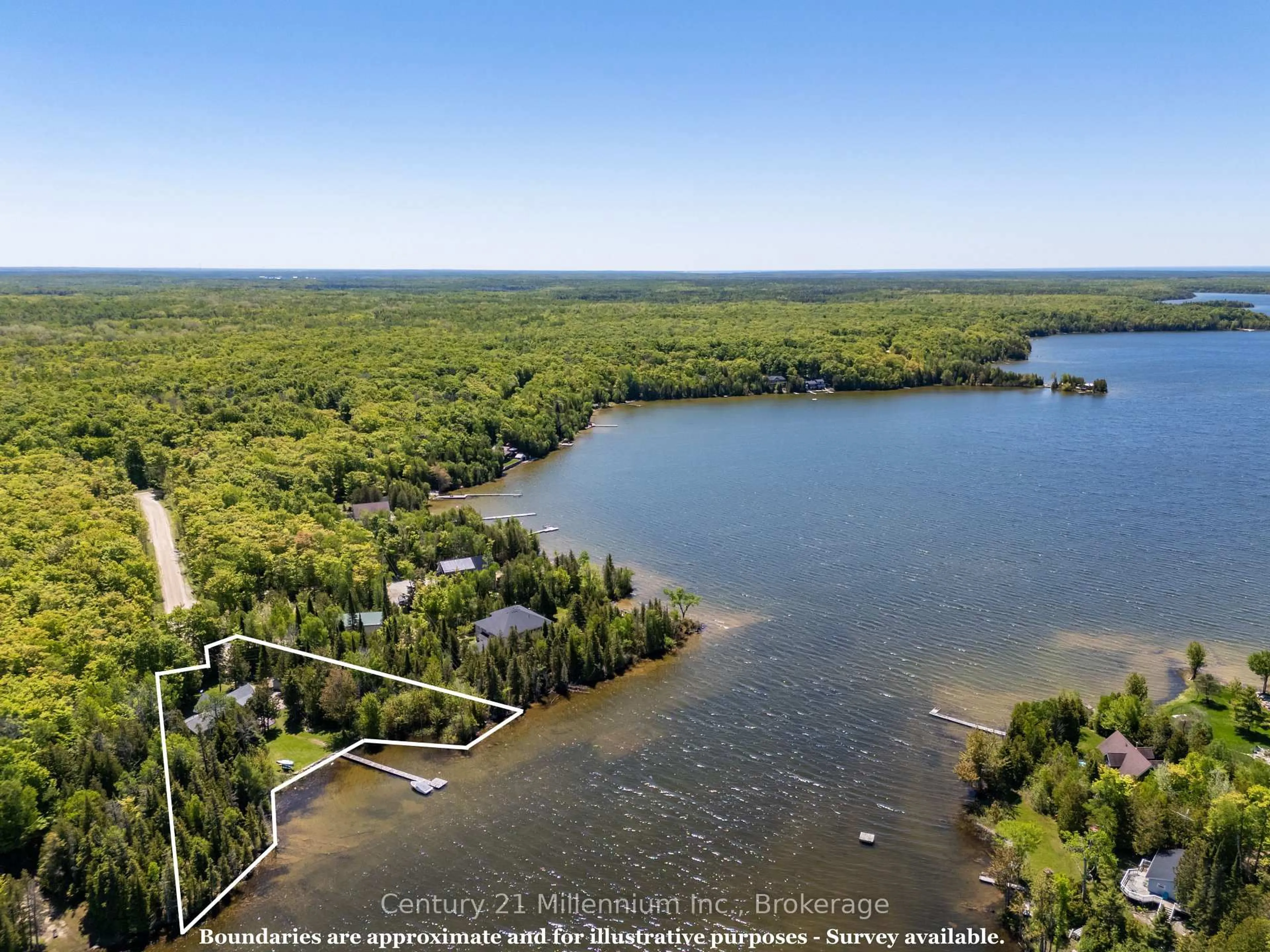 A pic from outside/outdoor area/front of a property/back of a property/a pic from drone, water/lake/river/ocean view for 20 Cottage Cove Rd, Northern Bruce Peninsula Ontario N0H 1W0