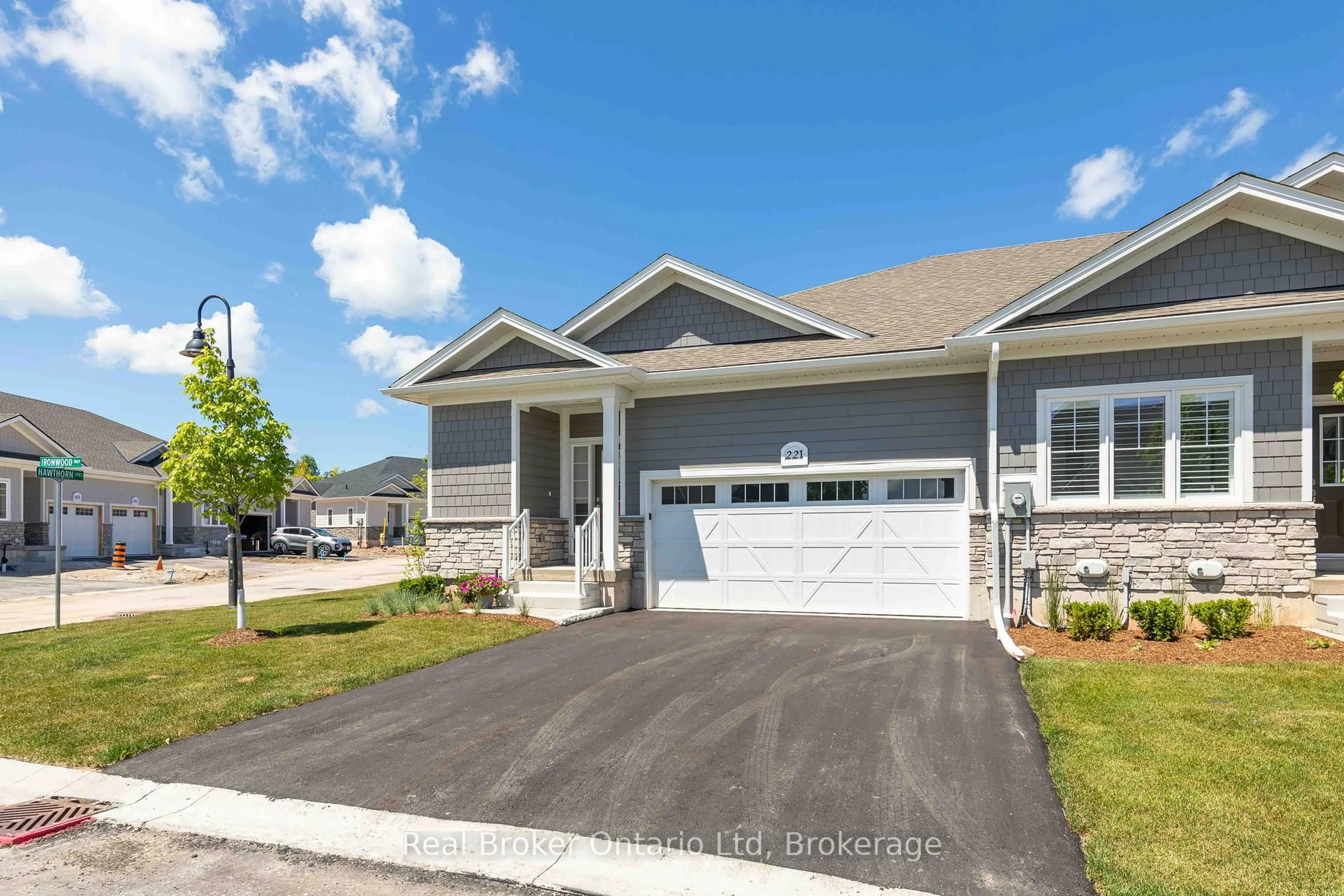 Home with vinyl exterior material, street for 221 Ironwood Way, Georgian Bluffs Ontario N0H 1S0
