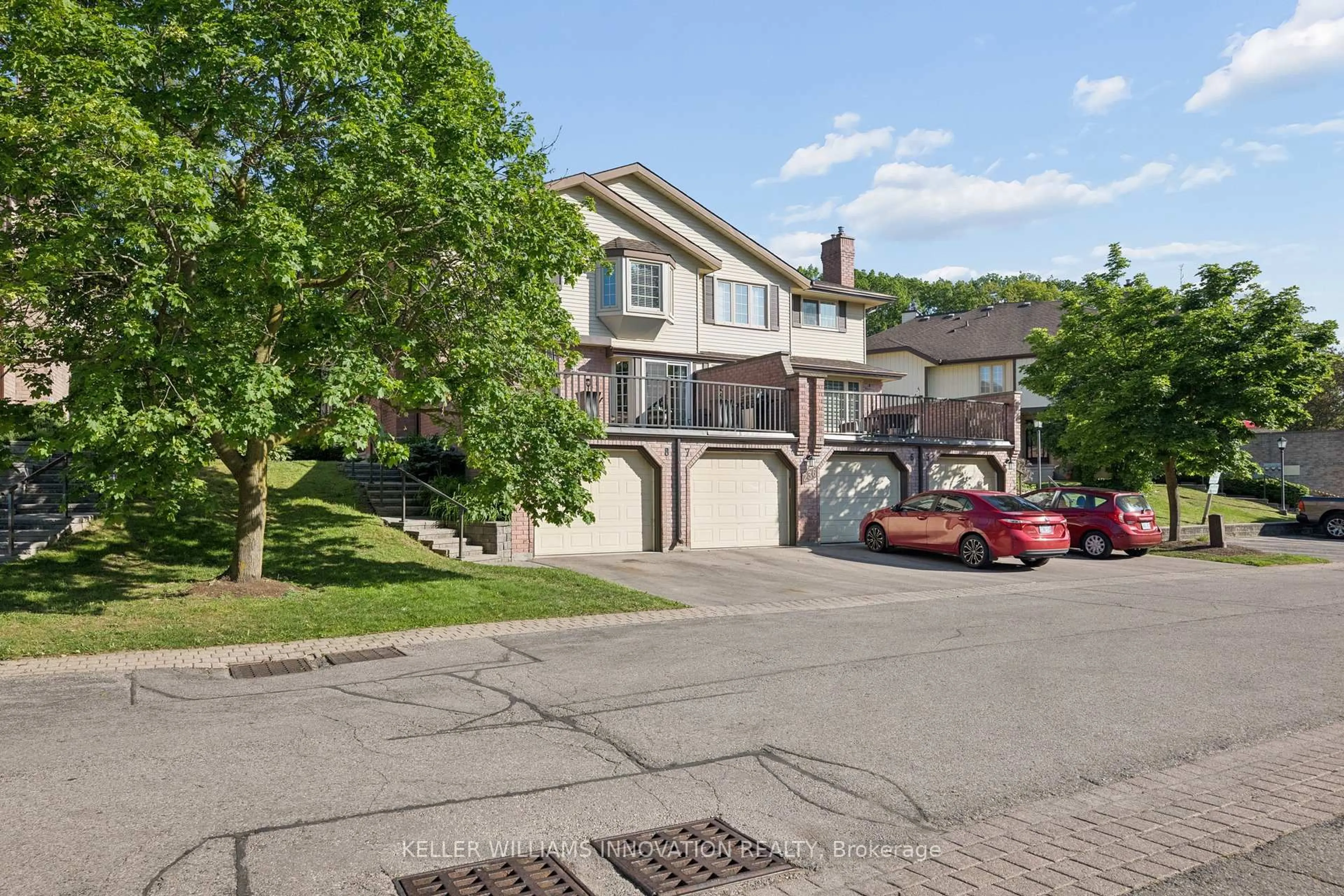 A pic from outside/outdoor area/front of a property/back of a property/a pic from drone, street for 236 Kingswood Dr #8, Kitchener Ontario N2E 2K2