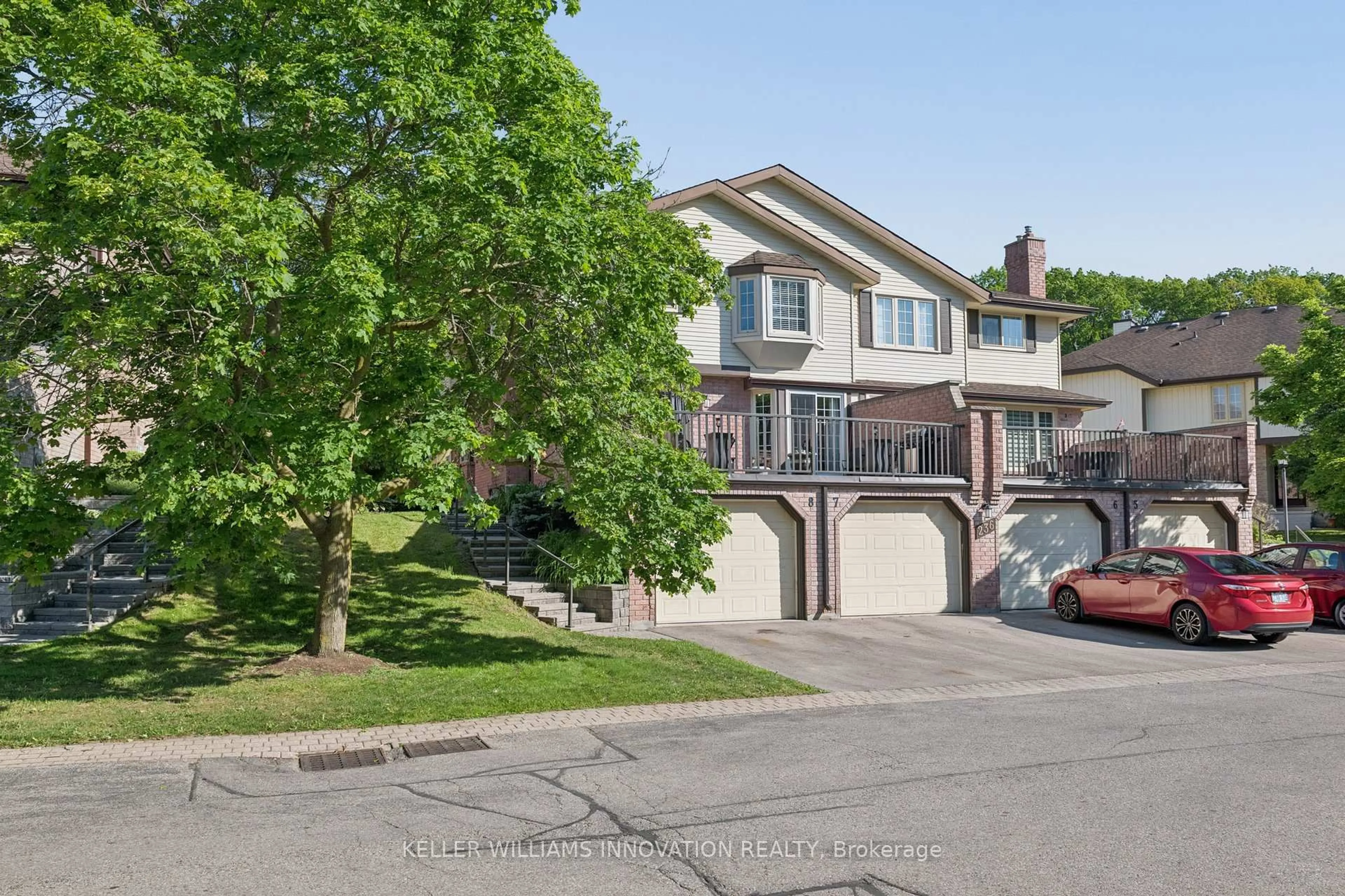 A pic from outside/outdoor area/front of a property/back of a property/a pic from drone, street for 236 Kingswood Dr #8, Kitchener Ontario N2E 2K2
