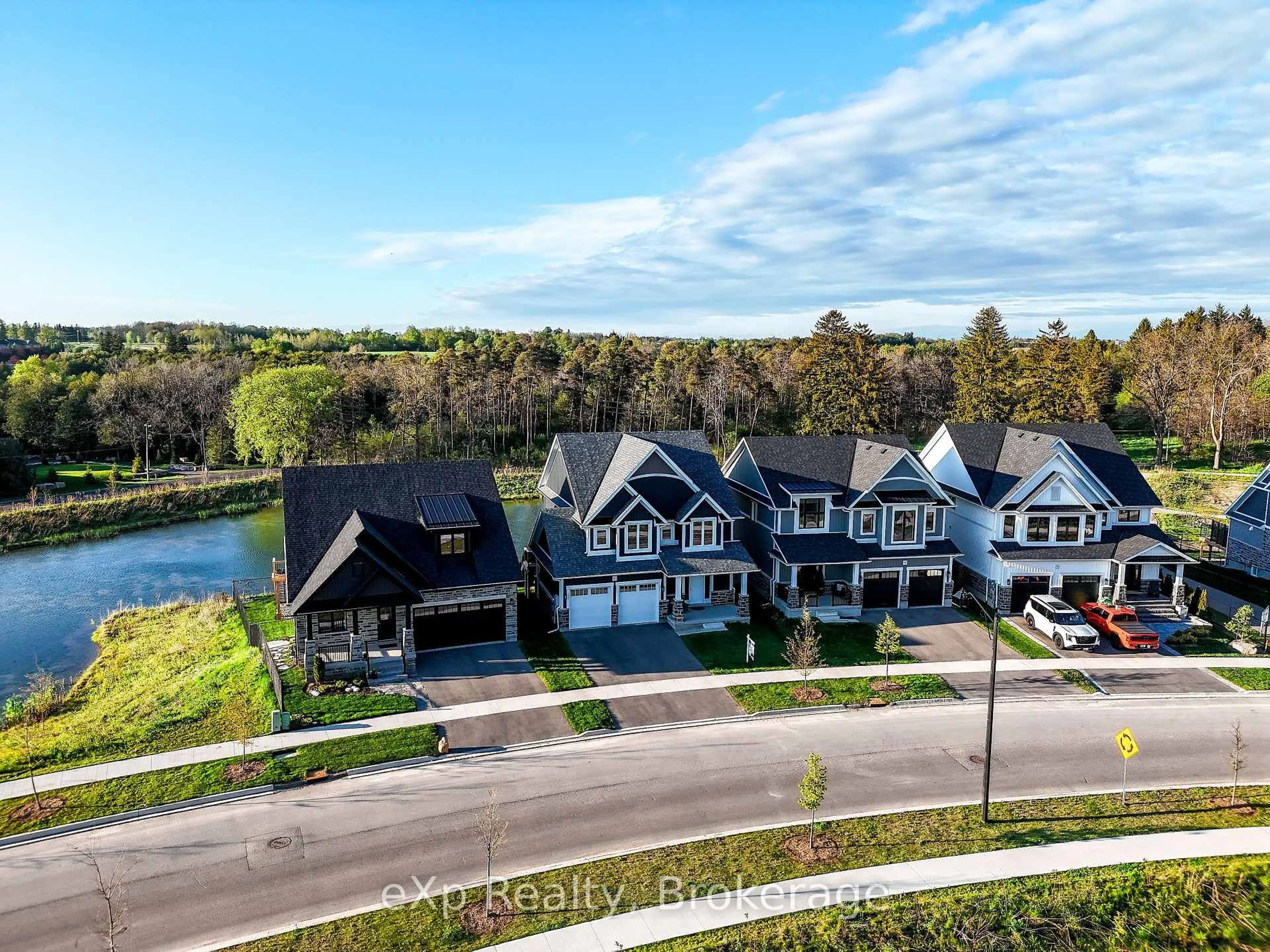 A pic from outside/outdoor area/front of a property/back of a property/a pic from drone, water/lake/river/ocean view for 62 Haylock Ave, Centre Wellington Ontario N0B 1S0