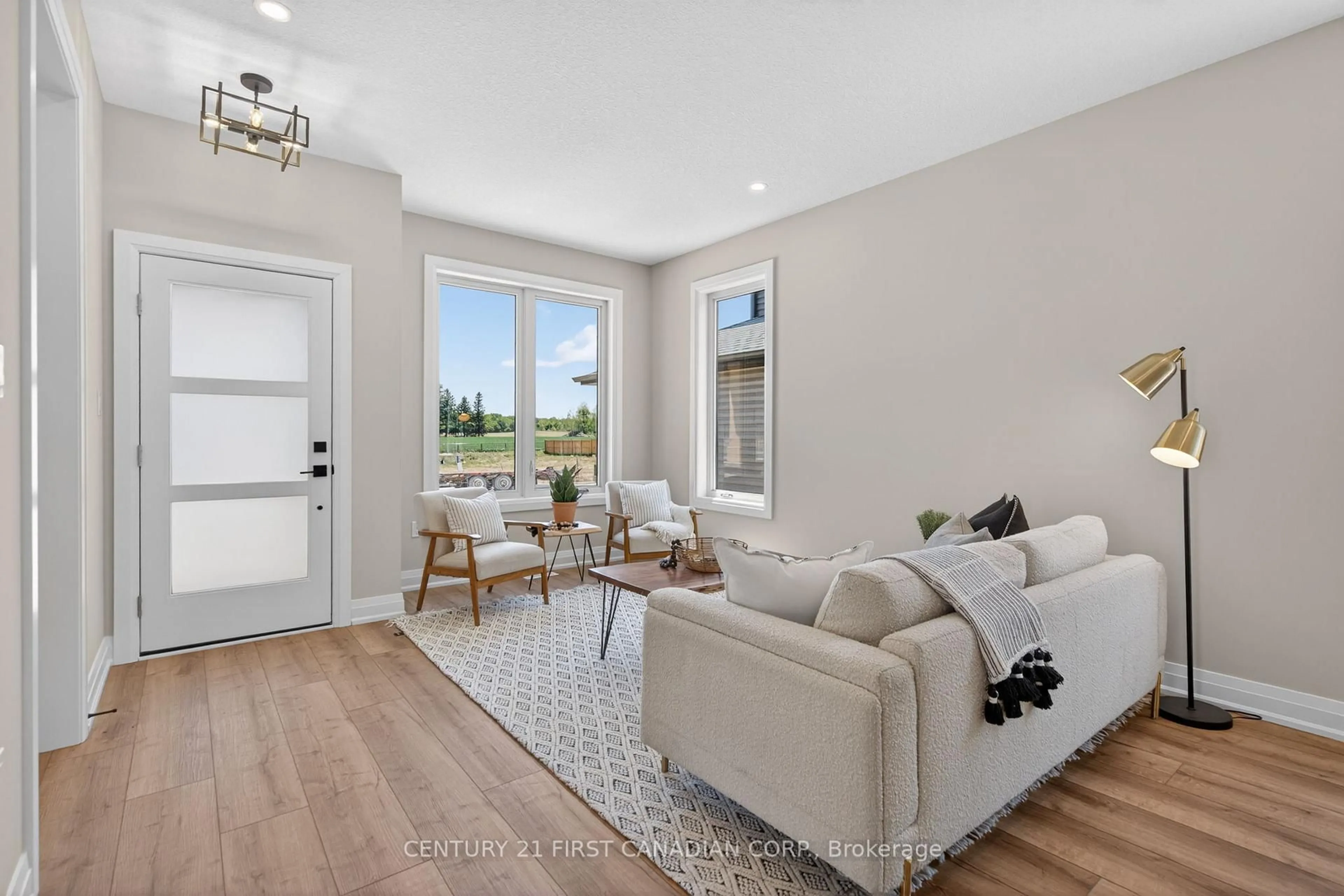 Living room with furniture, unknown for 11 Postma Cres, North Middlesex Ontario N0M 1A0