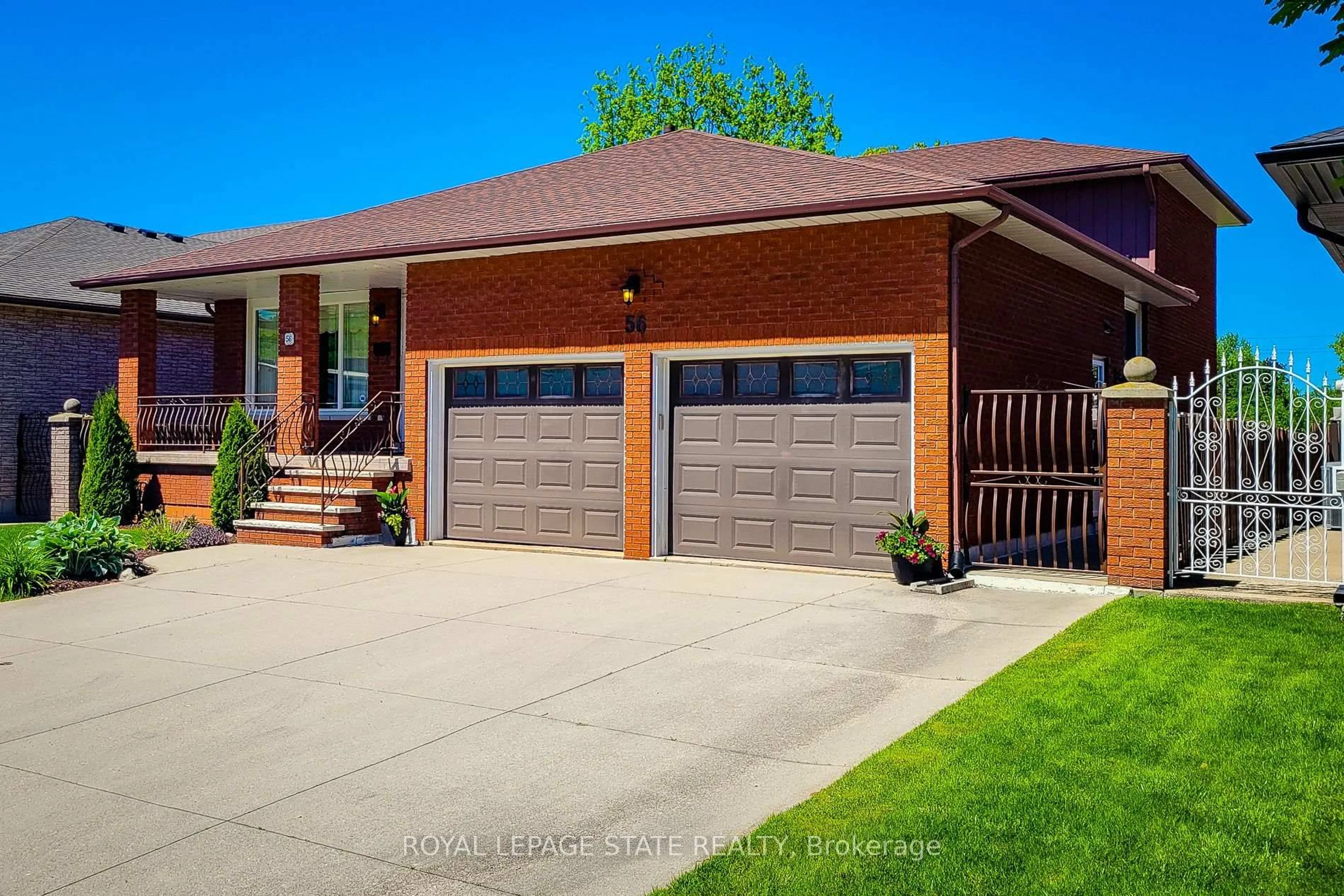 Home with brick exterior material, street for 56 Teak St, Hamilton Ontario L8G 4W5