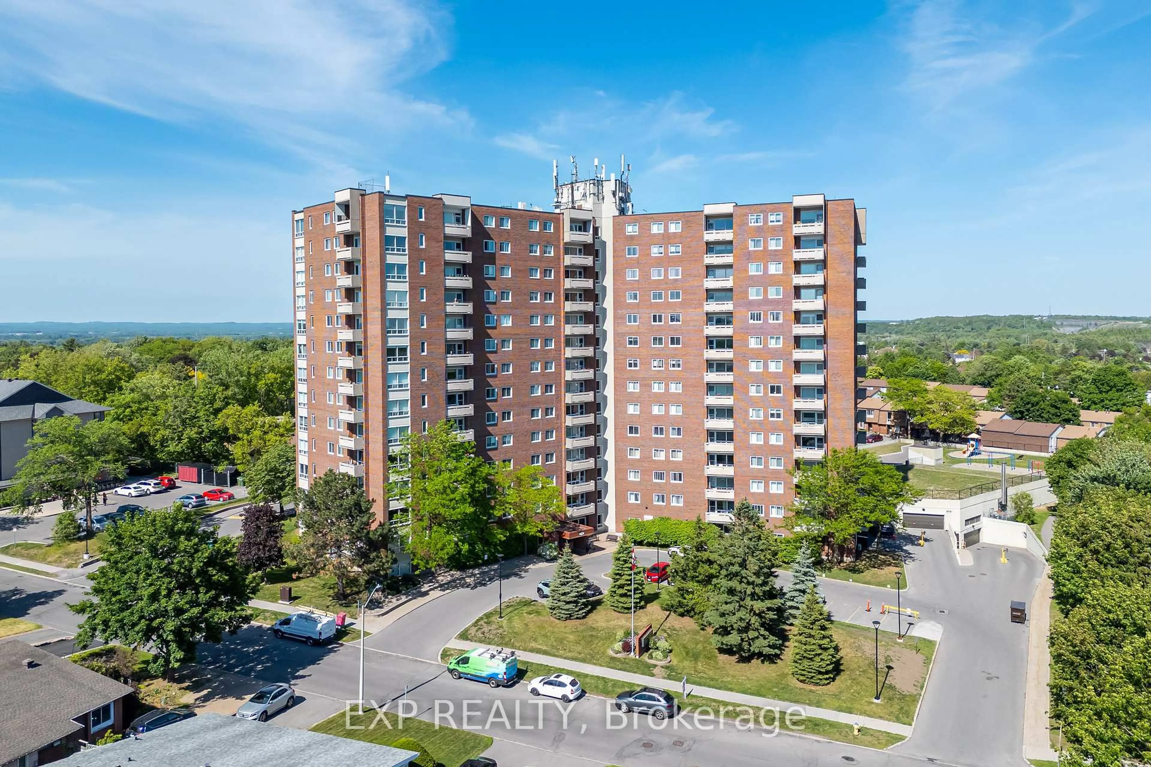 A pic from outside/outdoor area/front of a property/back of a property/a pic from drone, unknown for 915 Elmsmere Rd #203, Ottawa Ontario K1J 8H8