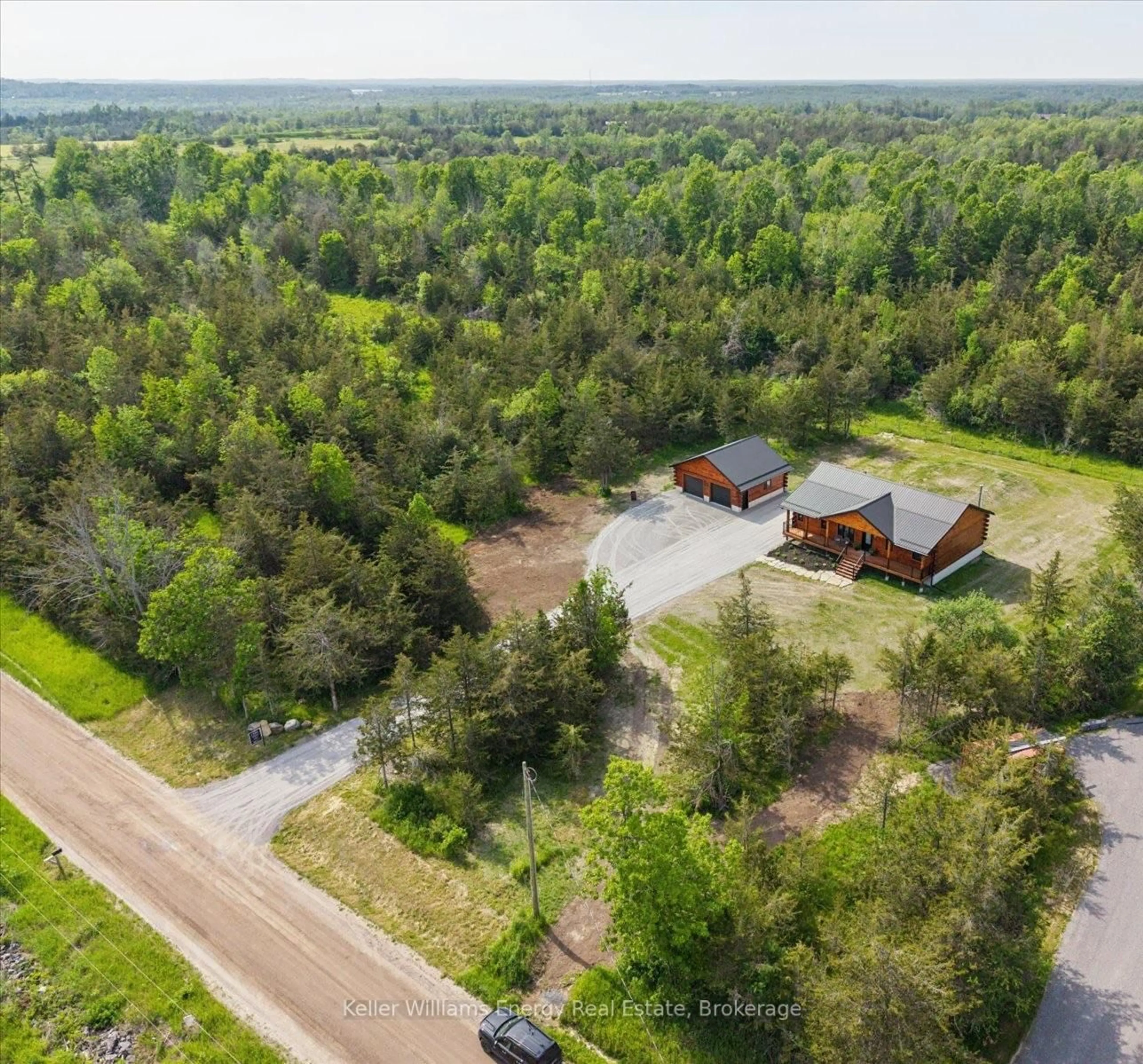 A pic from outside/outdoor area/front of a property/back of a property/a pic from drone, forest/trees view for 3374 10th Line East, Trent Hills Ontario K0L 1L0