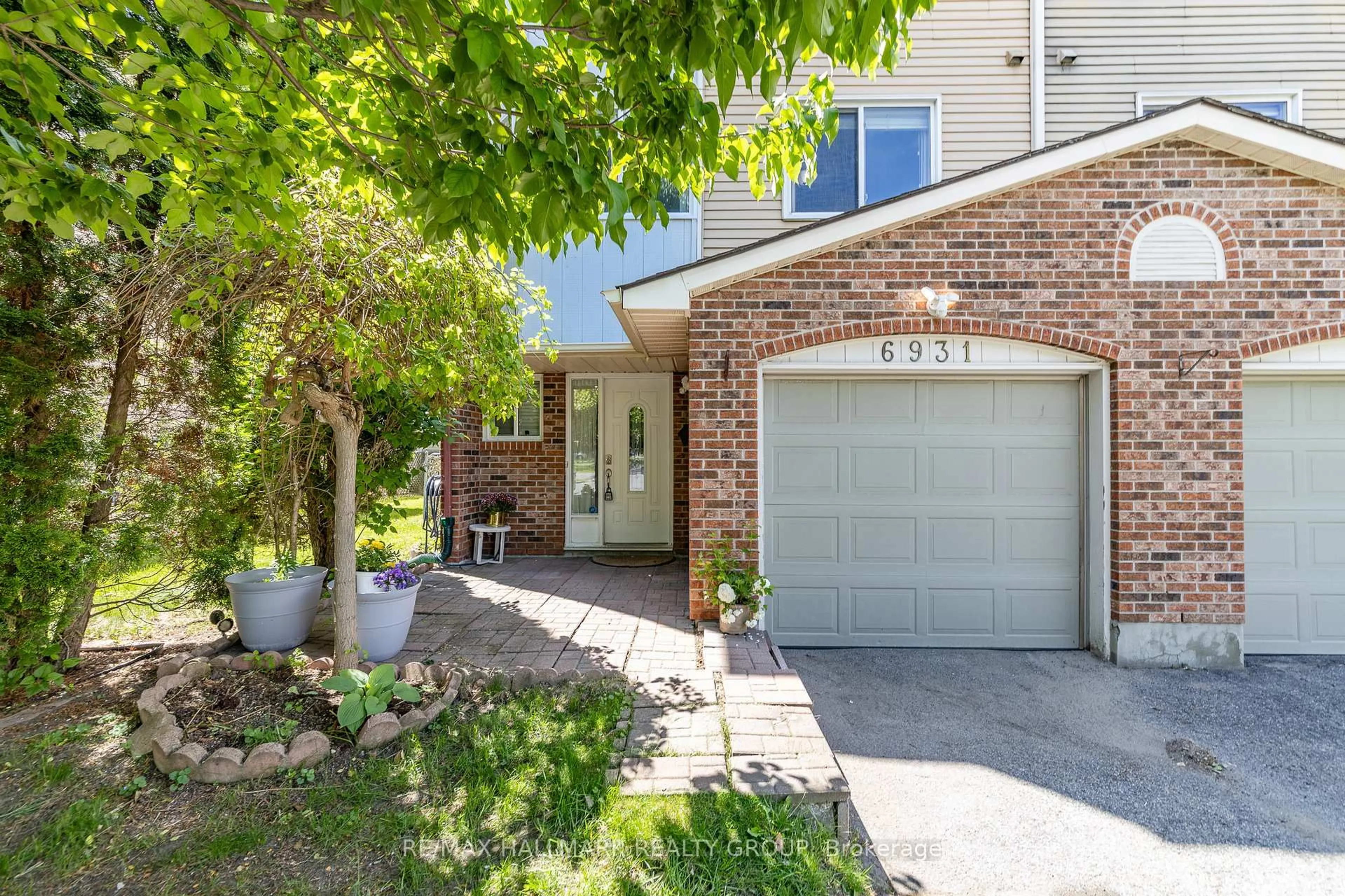 Home with brick exterior material, street for 6931 Du Bois Ave, Ottawa Ontario K1C 5L4