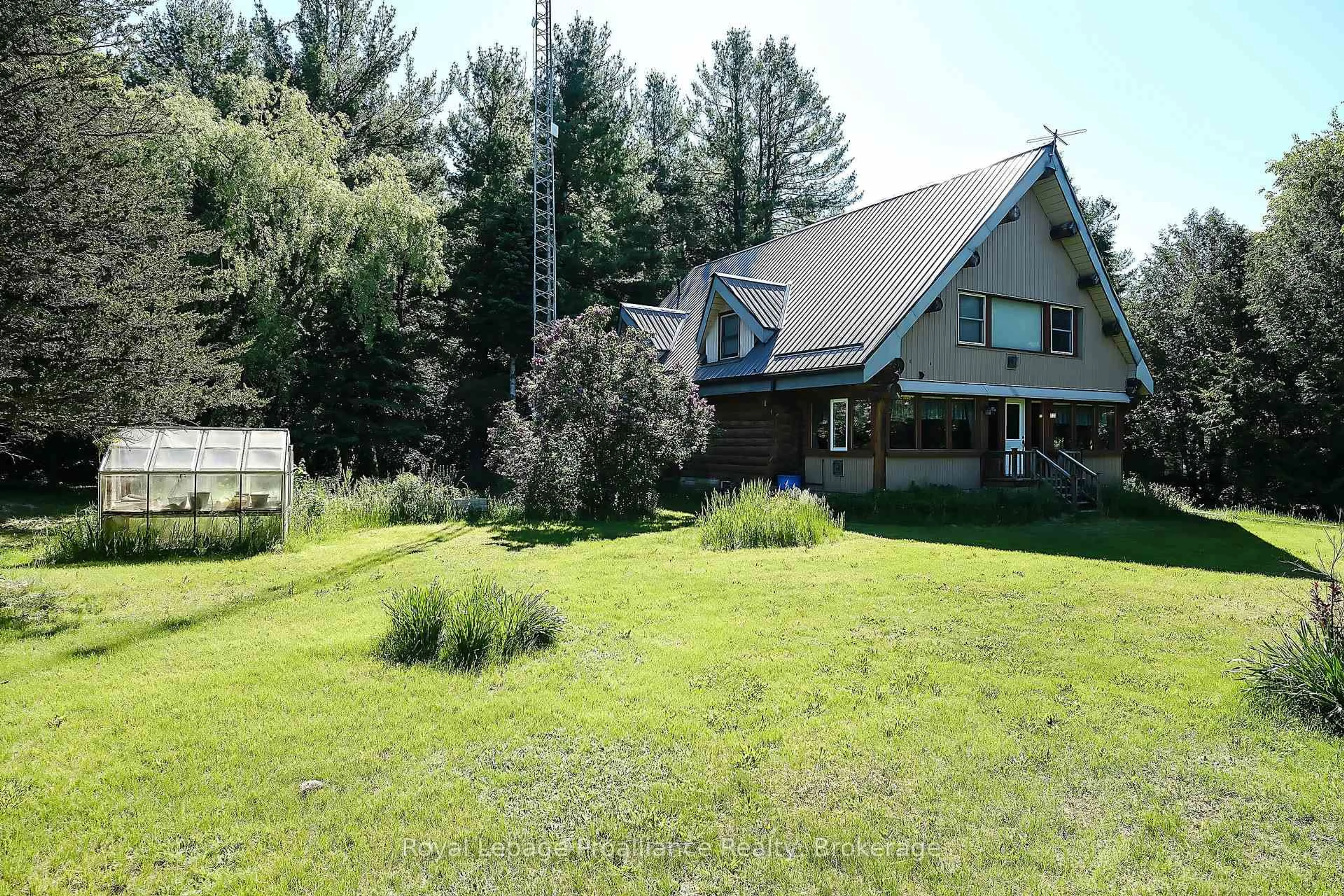 A pic from outside/outdoor area/front of a property/back of a property/a pic from drone, mountain view for 11 Crookston Rd, Madoc Ontario K0K 2K0